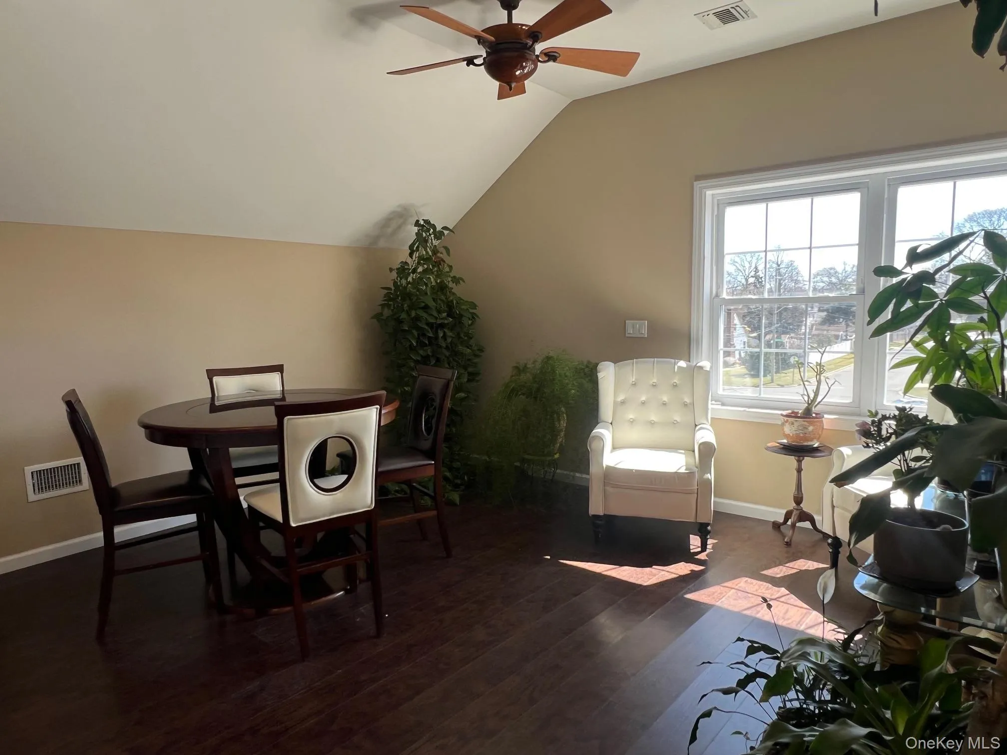 Sitting/Waiting Area space with ceiling fan, dark wood-style flooring, and lofted ceiling Sitting/Waiting Area space with ceiling fan, dark wood-style flooring, and lofted ceiling