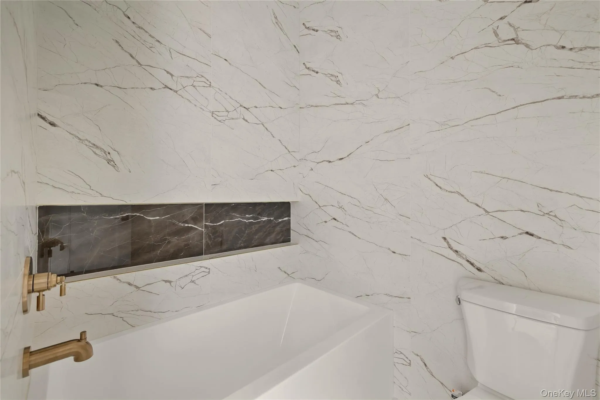 Full bath with a bath and toilet Full bath with a bath and toilet