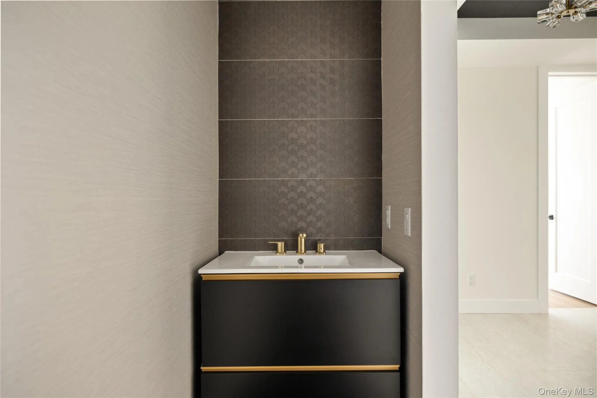 Bathroom with vanity and tile walls Bathroom with vanity and tile walls