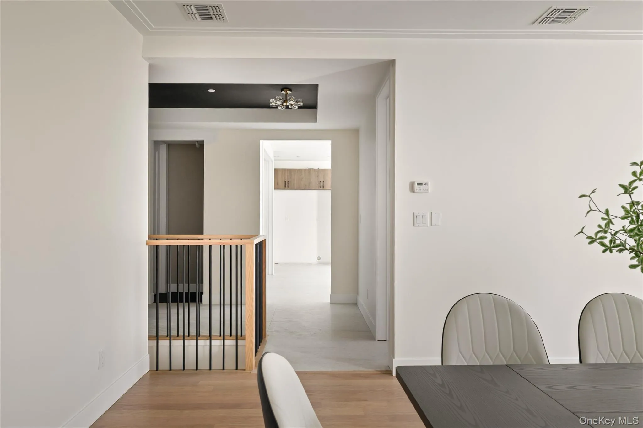 Dining space with light wood-type flooring and baseboards Dining space with light wood-type flooring and baseboards