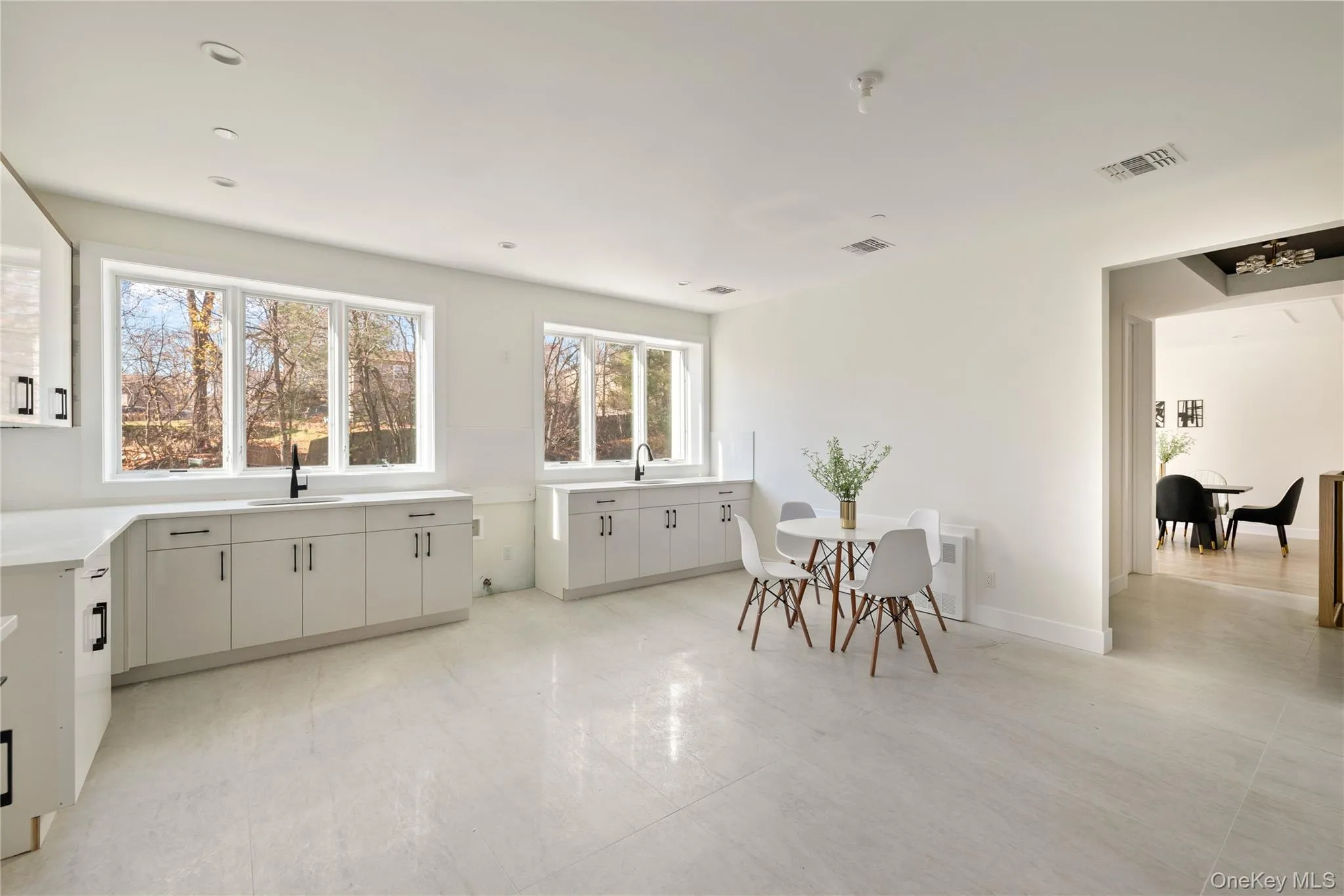 Dining room with baseboards and radiator heating unit Dining room with baseboards and radiator heating unit