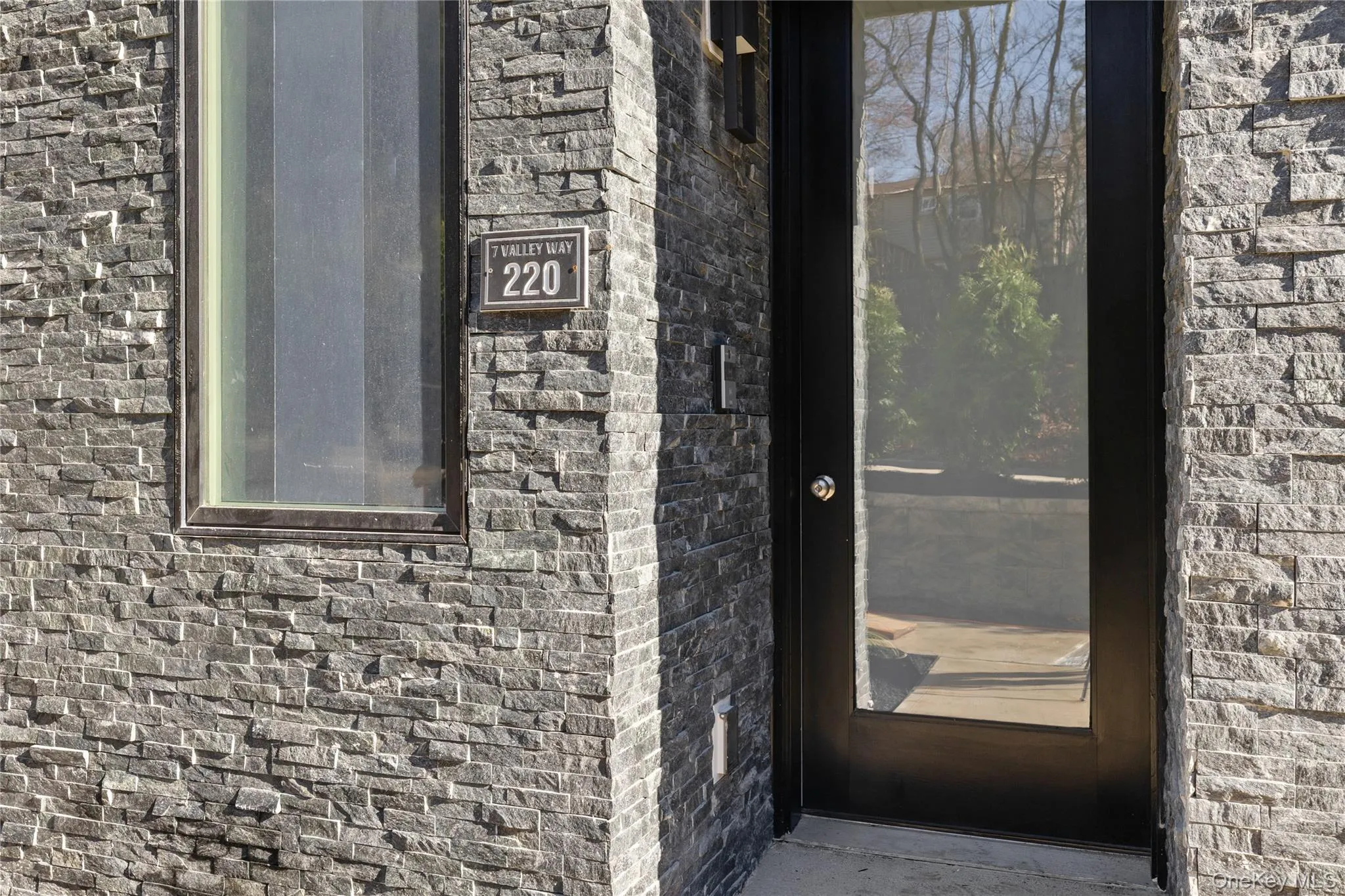 View of exterior entry featuring brick siding View of exterior entry featuring brick siding