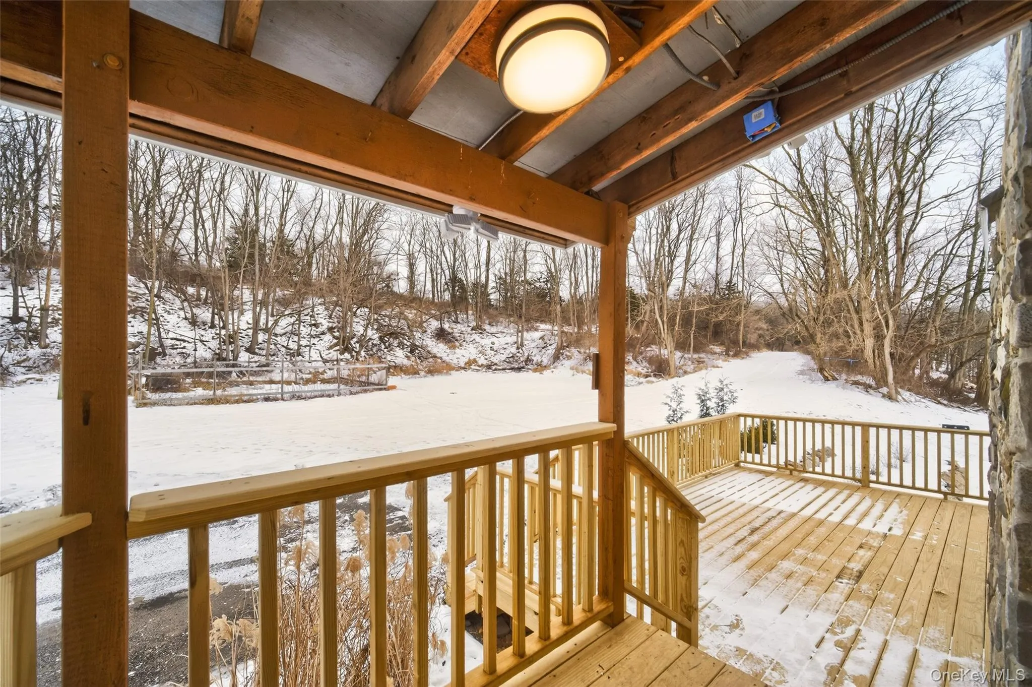 View of snow covered deck View of snow covered deck