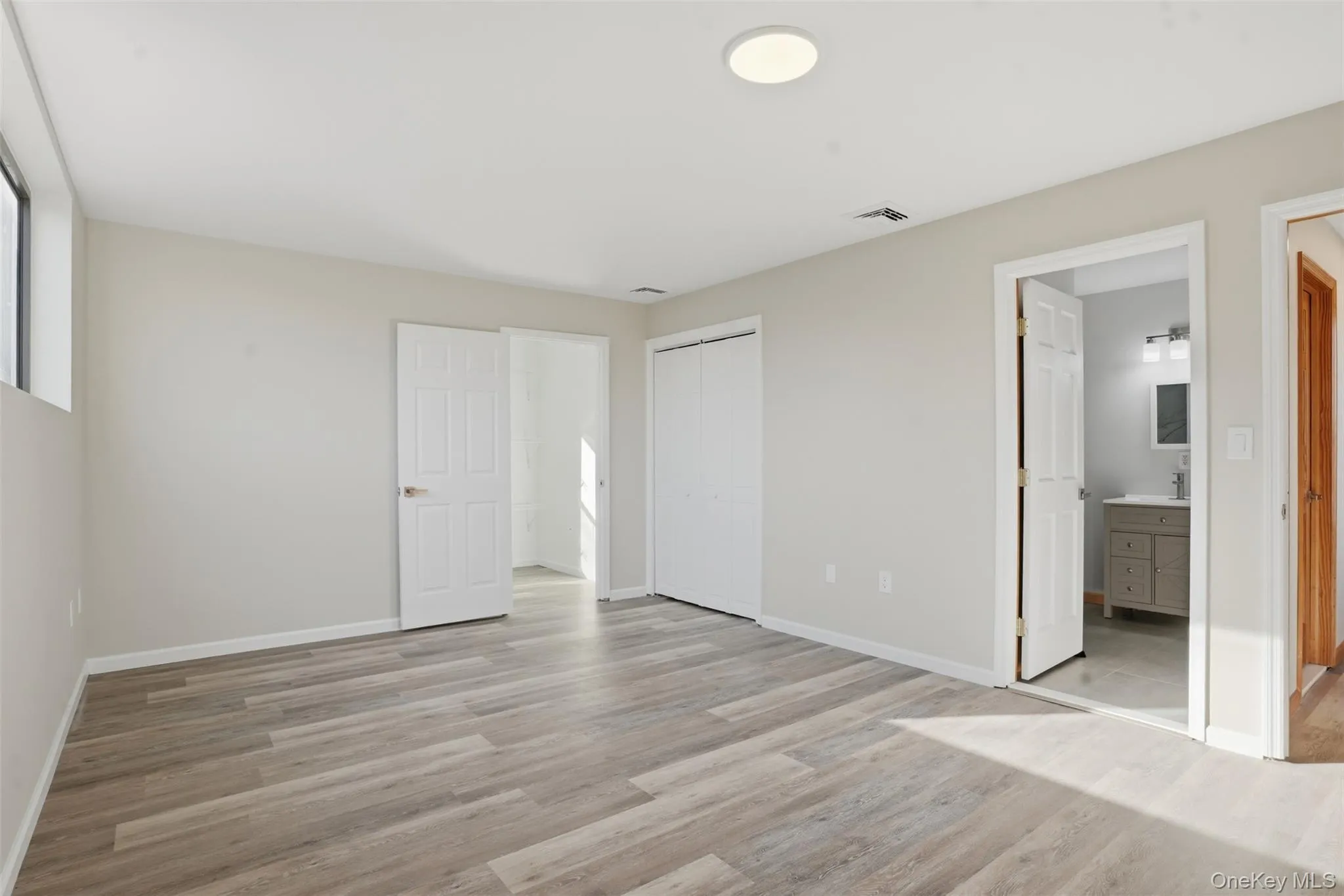 Walk-in closet, secondary closet, and bathroom Walk-in closet, secondary closet, and bathroom