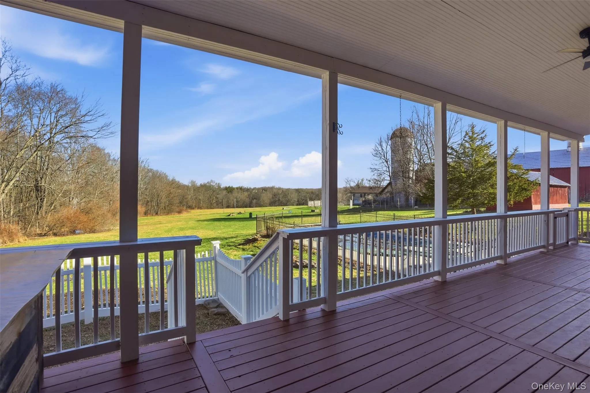 Deck overlooking the inground pool and backyard Deck overlooking the inground pool and backyard