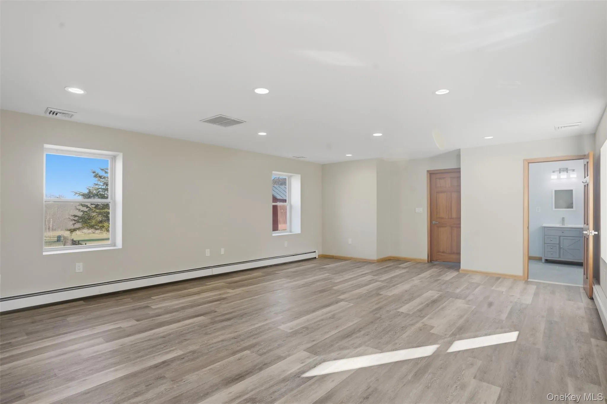 Living room with a bathroom and den/office adjacent Living room with a bathroom and den/office adjacent