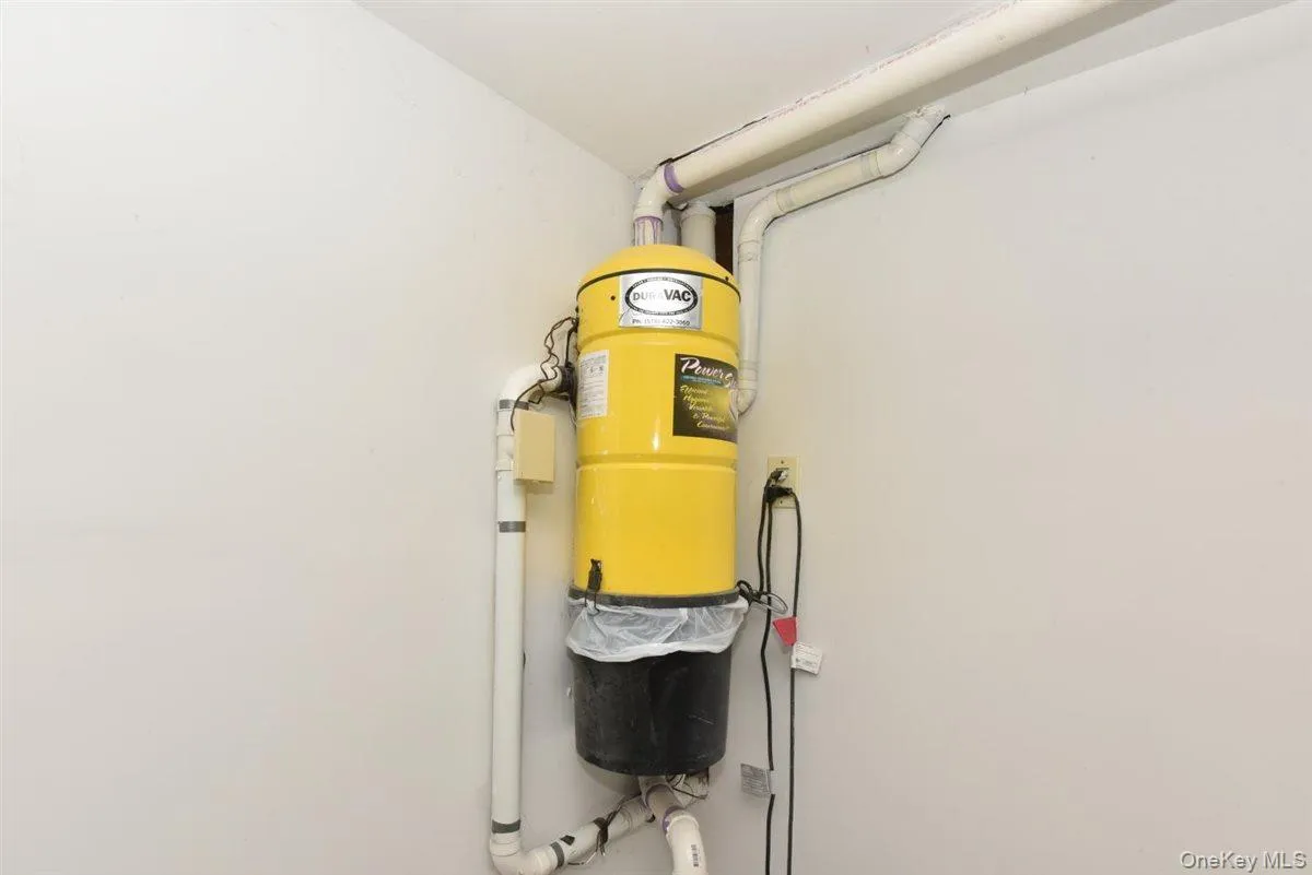 Utility room featuring a central vacuum unit Utility room featuring a central vacuum unit