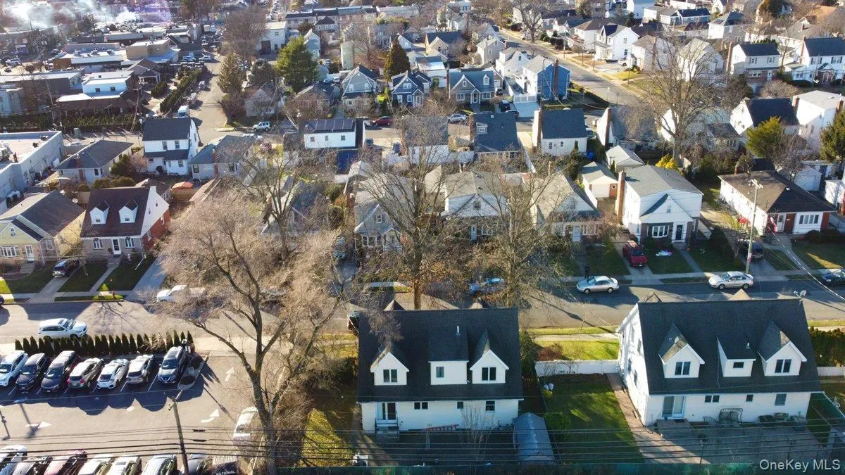 Aerial overview of property's location featuring nearby suburban area Aerial overview of property's location featuring nearby suburban area