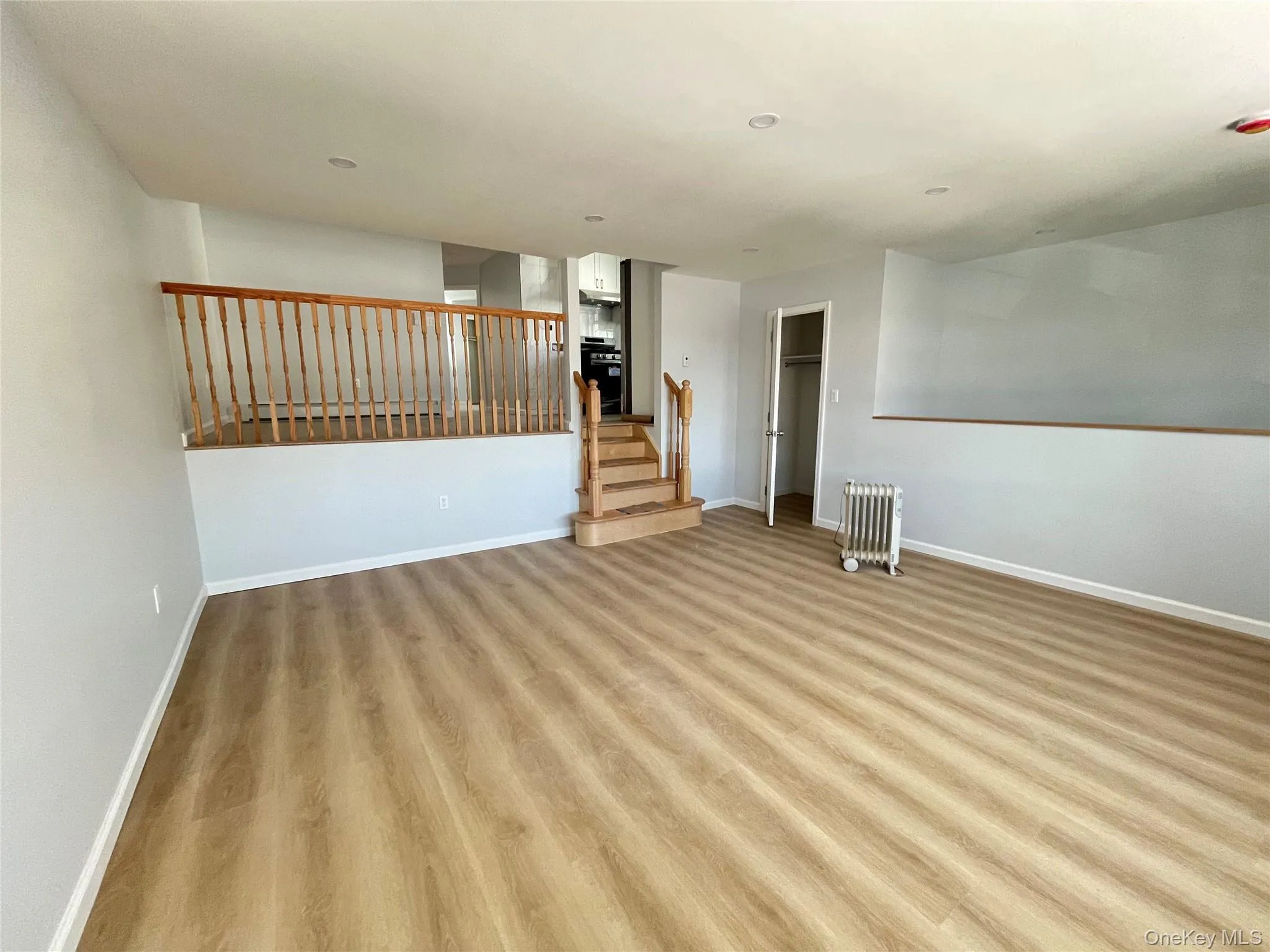 Living room with light wood-style floors Living room with light wood-style floors