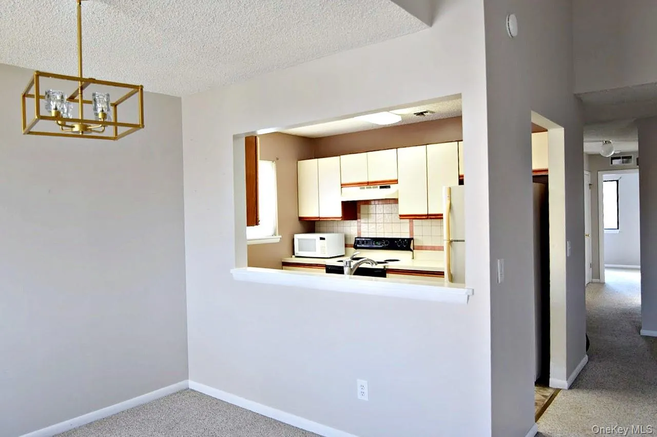 Dining area with a view of the kitchen Dining area with a view of the kitchen