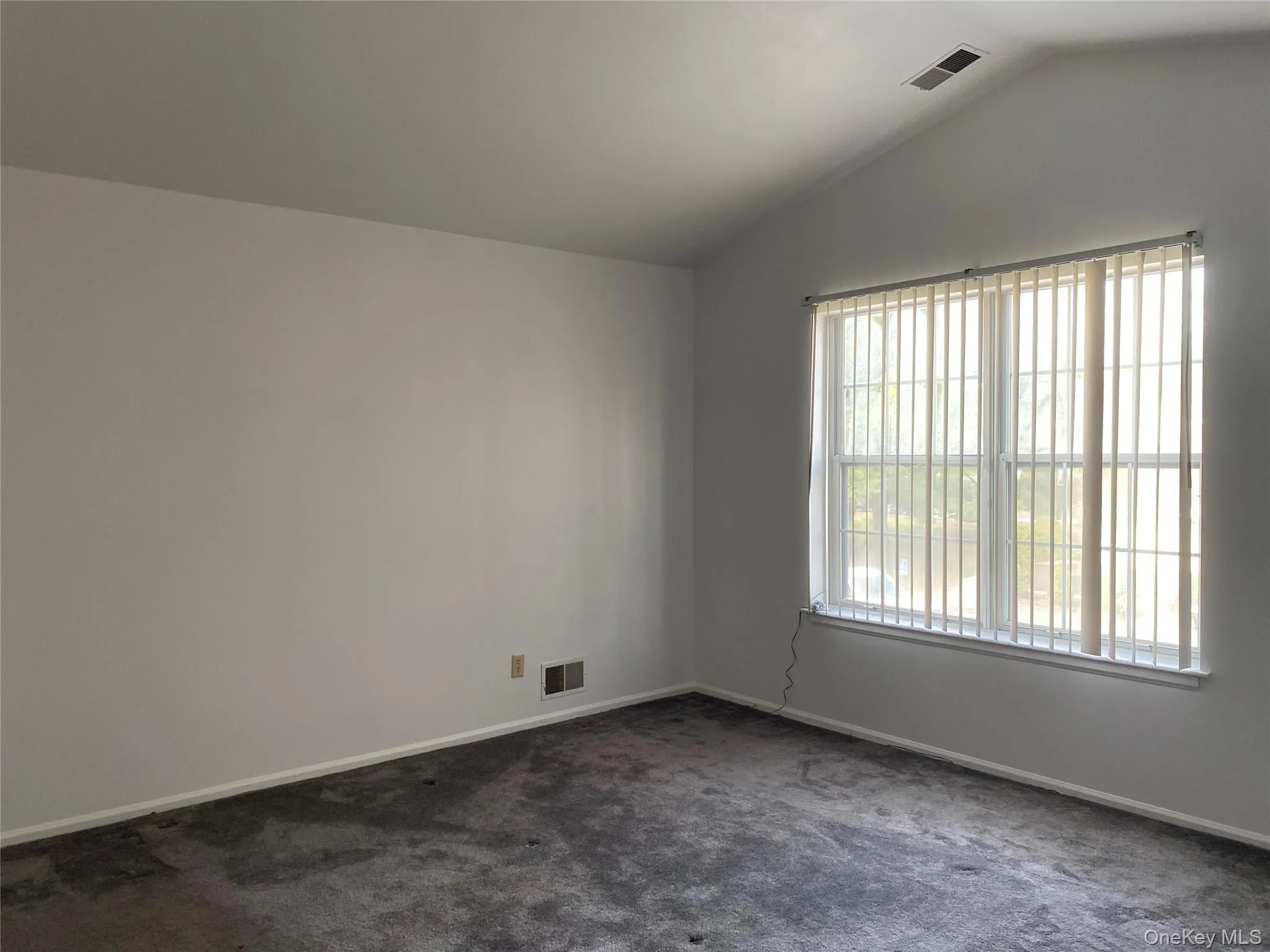 Master bedroom with cathedral ceiling. Master bedroom with cathedral ceiling.