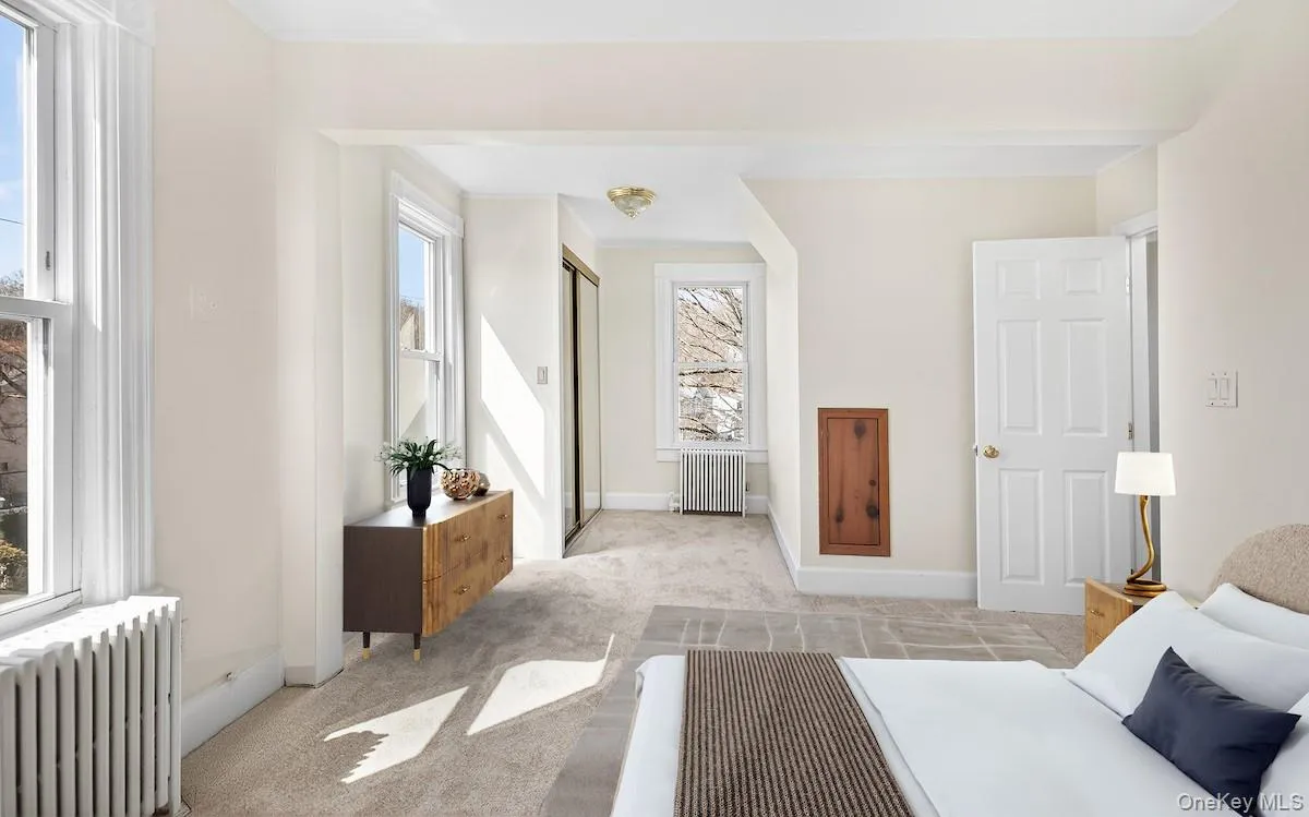 Primary bedroom, virtually staged Primary bedroom, virtually staged