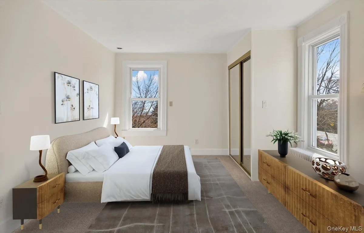 Primary bedroom, virtually staged Primary bedroom, virtually staged
