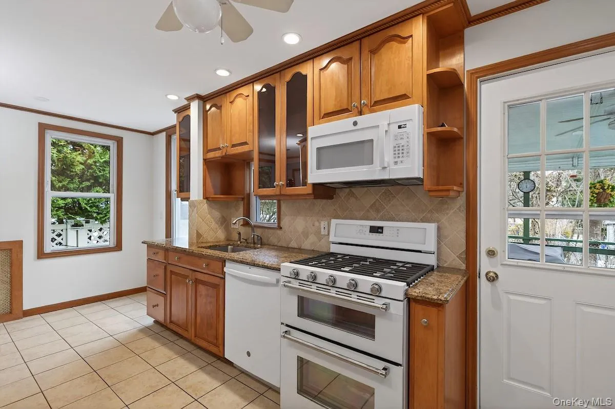 Eat-in kitchen with door to covered porch Eat-in kitchen with door to covered porch