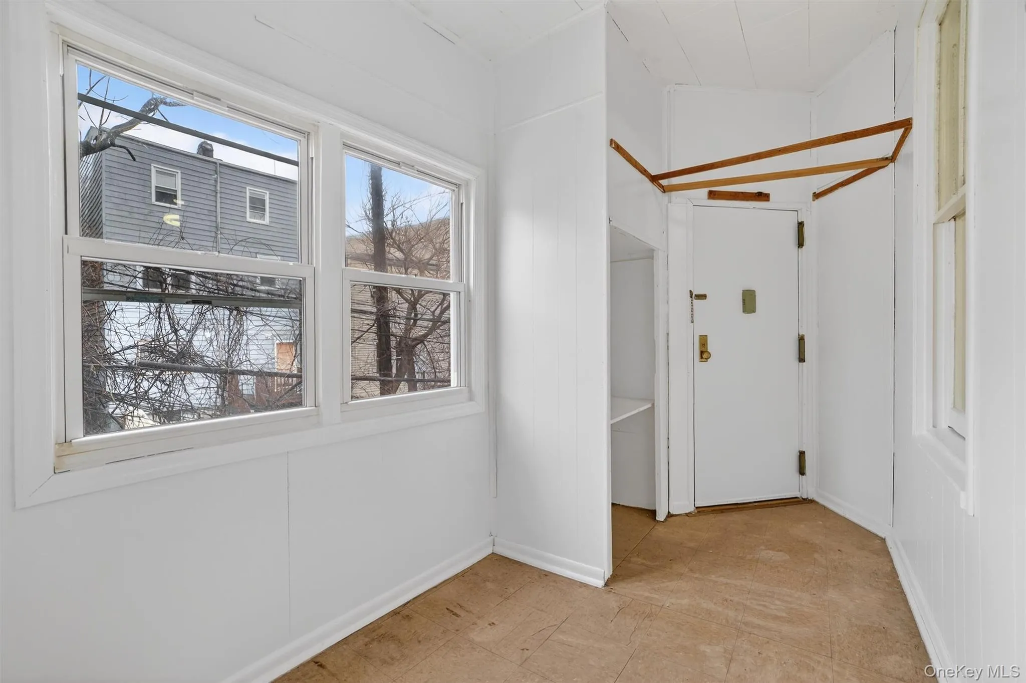 Bonus room with door to back stairway Bonus room with door to back stairway