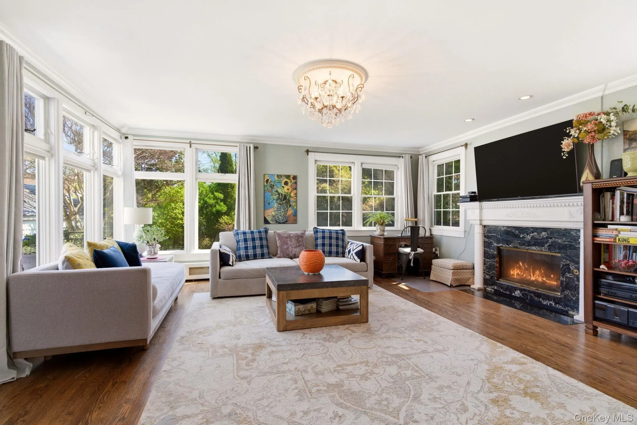 Fully windowed and wood burning fireplace in a room of grandeur in size Fully windowed and wood burning fireplace in a room of grandeur in size