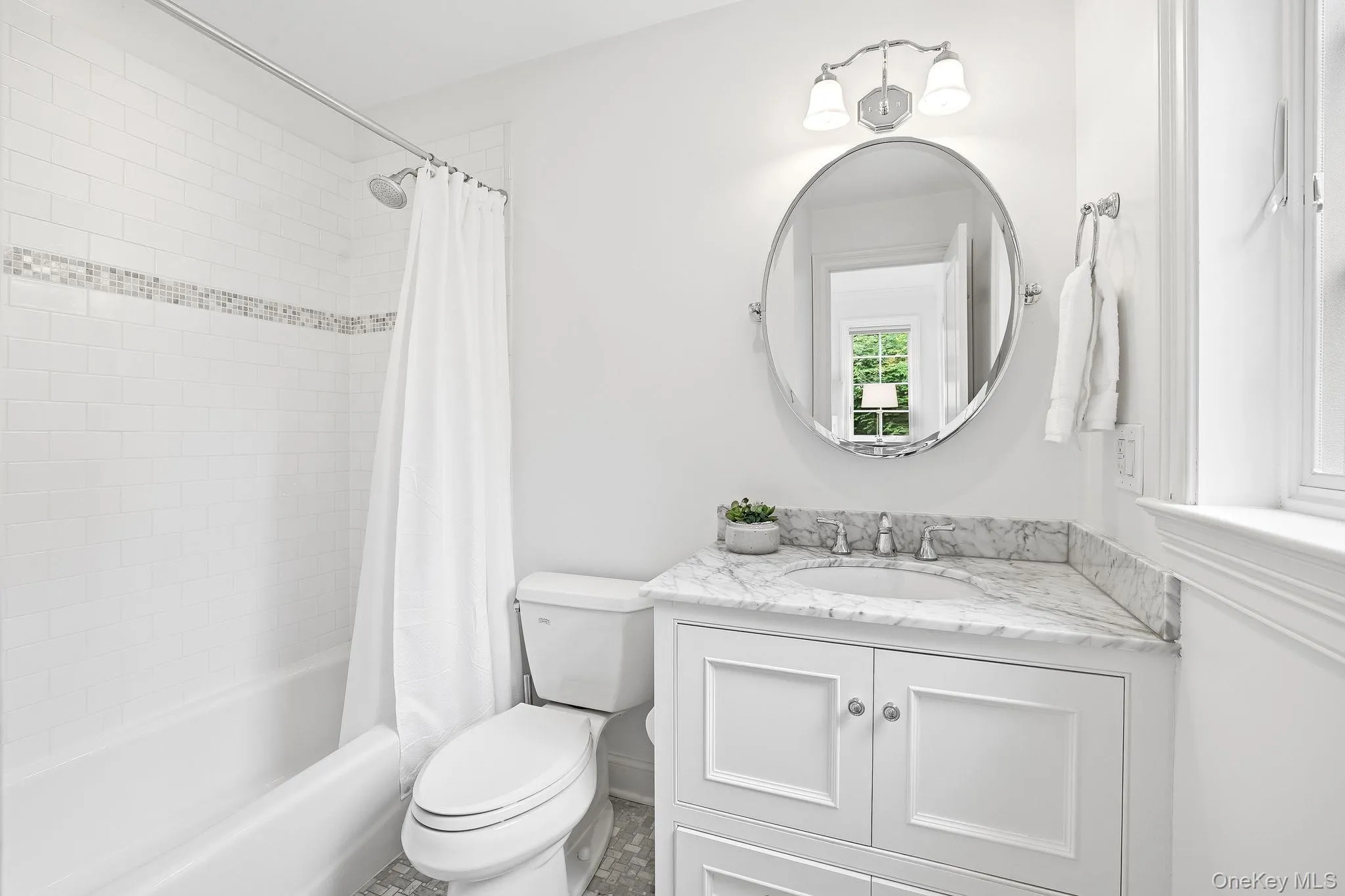 Ensuite bathroom for first level bedroom. Ensuite bathroom for first level bedroom.