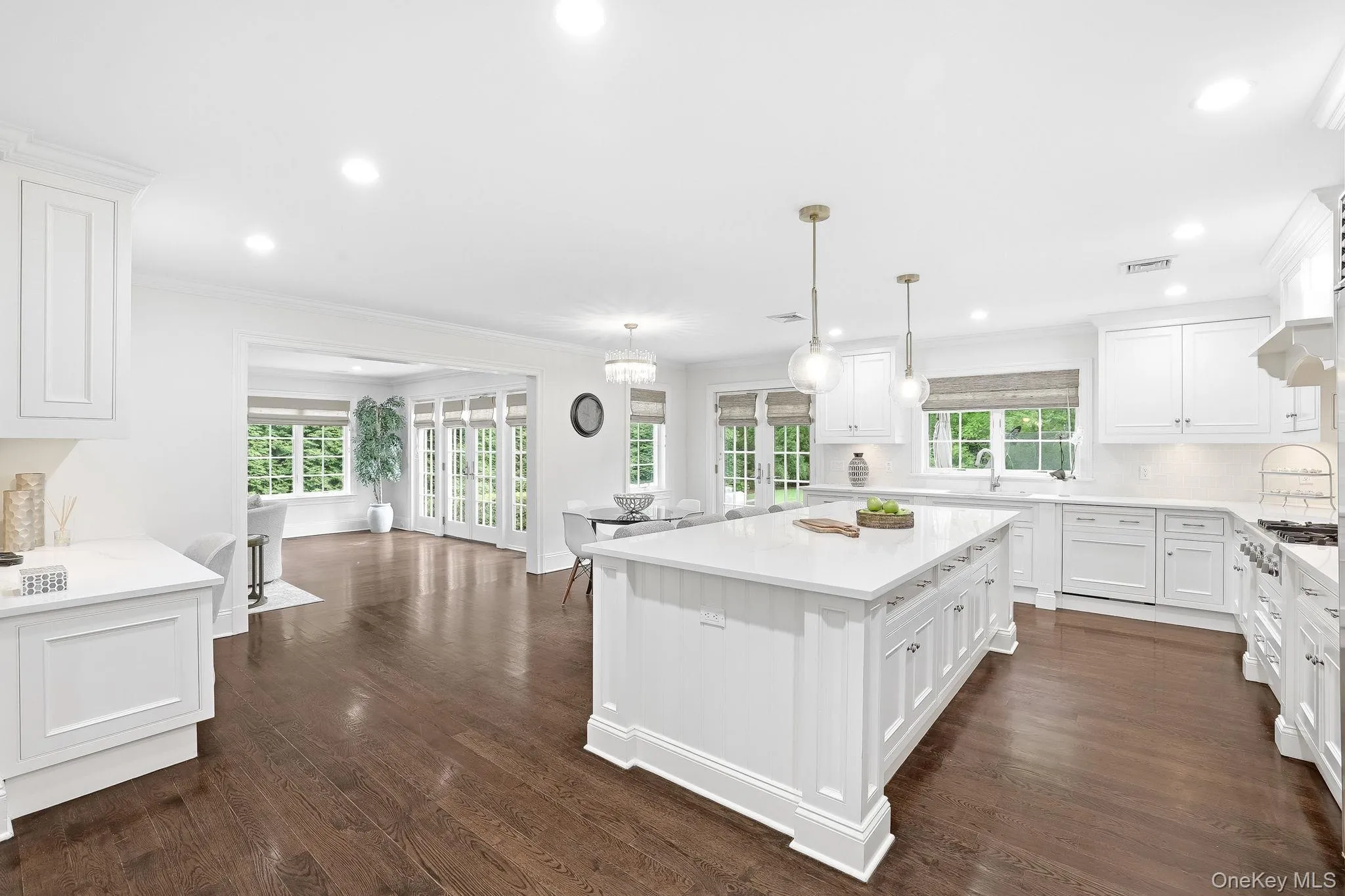 One last look at the expansive kitchen, overlooking the picturesque yard. One last look at the expansive kitchen, overlooking the picturesque yard.