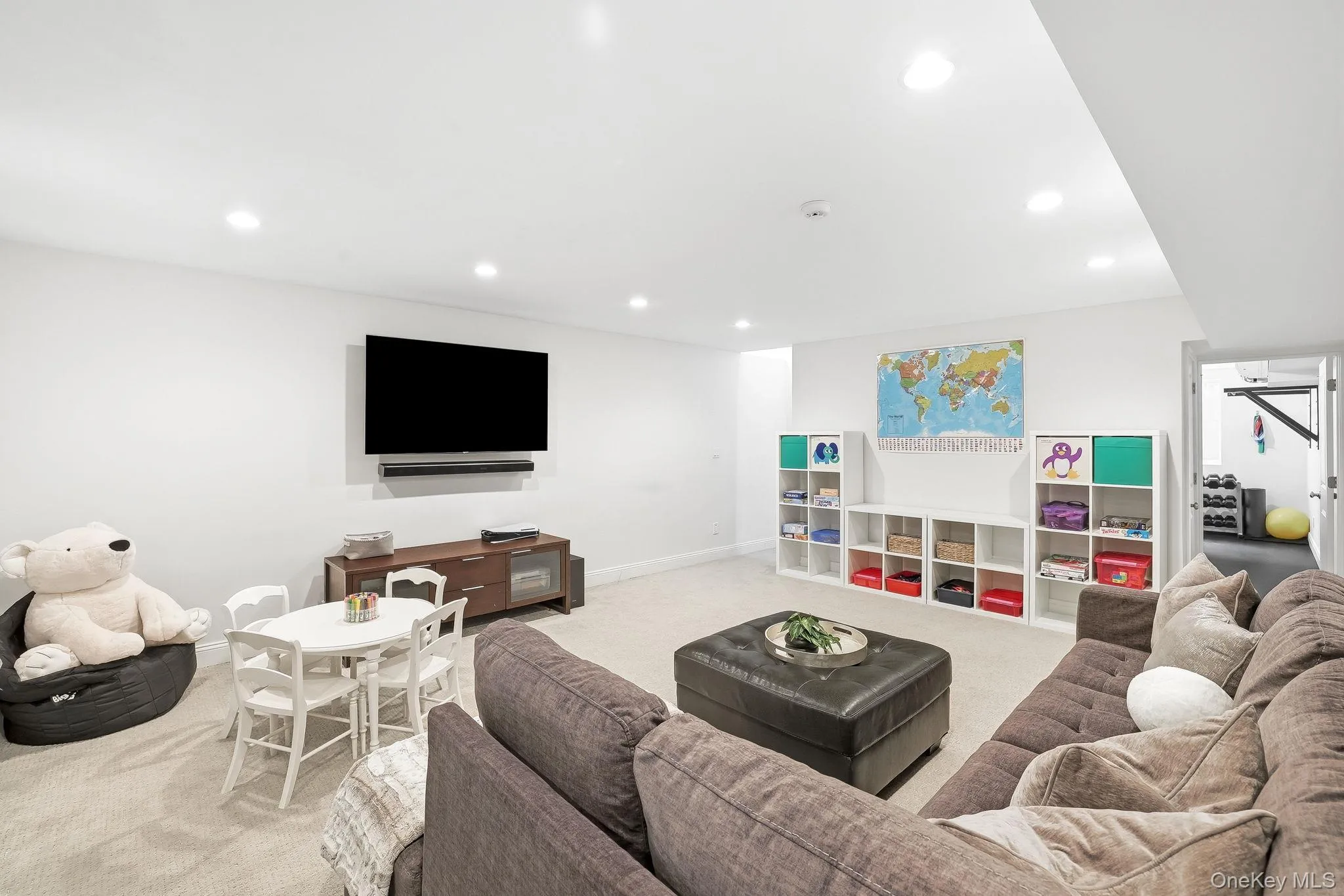 The finished lower level offers the perfect space for recreational pursuits. The finished lower level offers the perfect space for recreational pursuits.