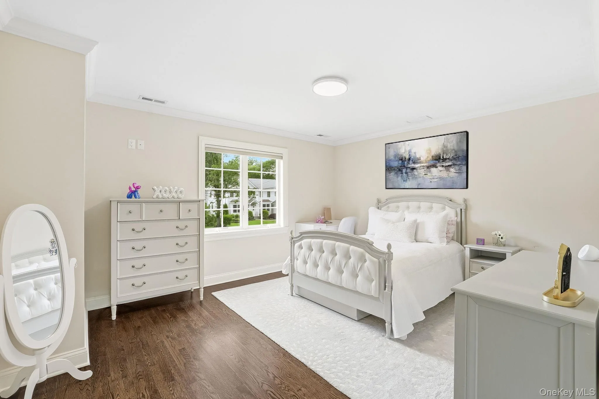 Another generously sized family bedroom featuring hardwood floors and outfitted closet. Another generously sized family bedroom featuring hardwood floors and outfitted closet.