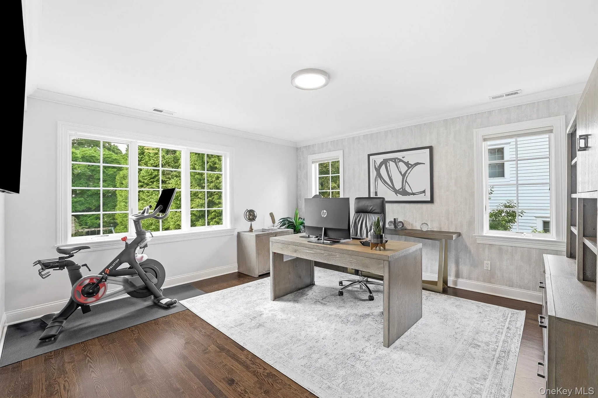 Another well proportioned bedroom, currently used as a home office with hardwood floors and multiple exposures. Another well proportioned bedroom, currently used as a home office with hardwood floors and multiple exposures.