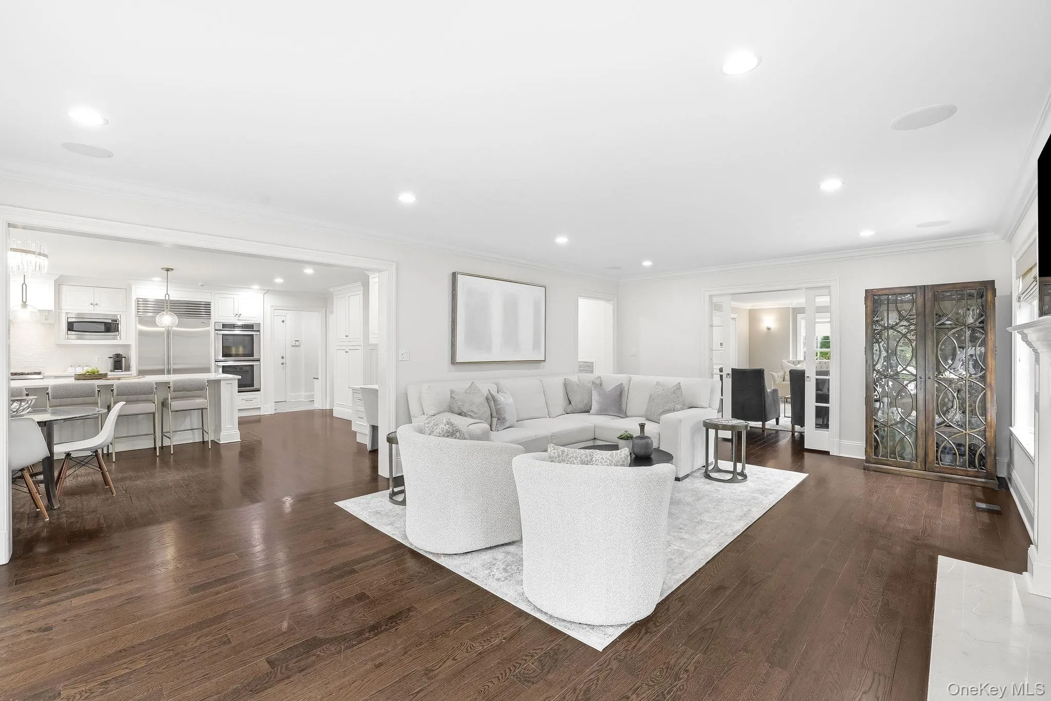 Another perspective highlighting the generous scale of the family room right off the kitchen and living room. Another perspective highlighting the generous scale of the family room right off the kitchen and living room.