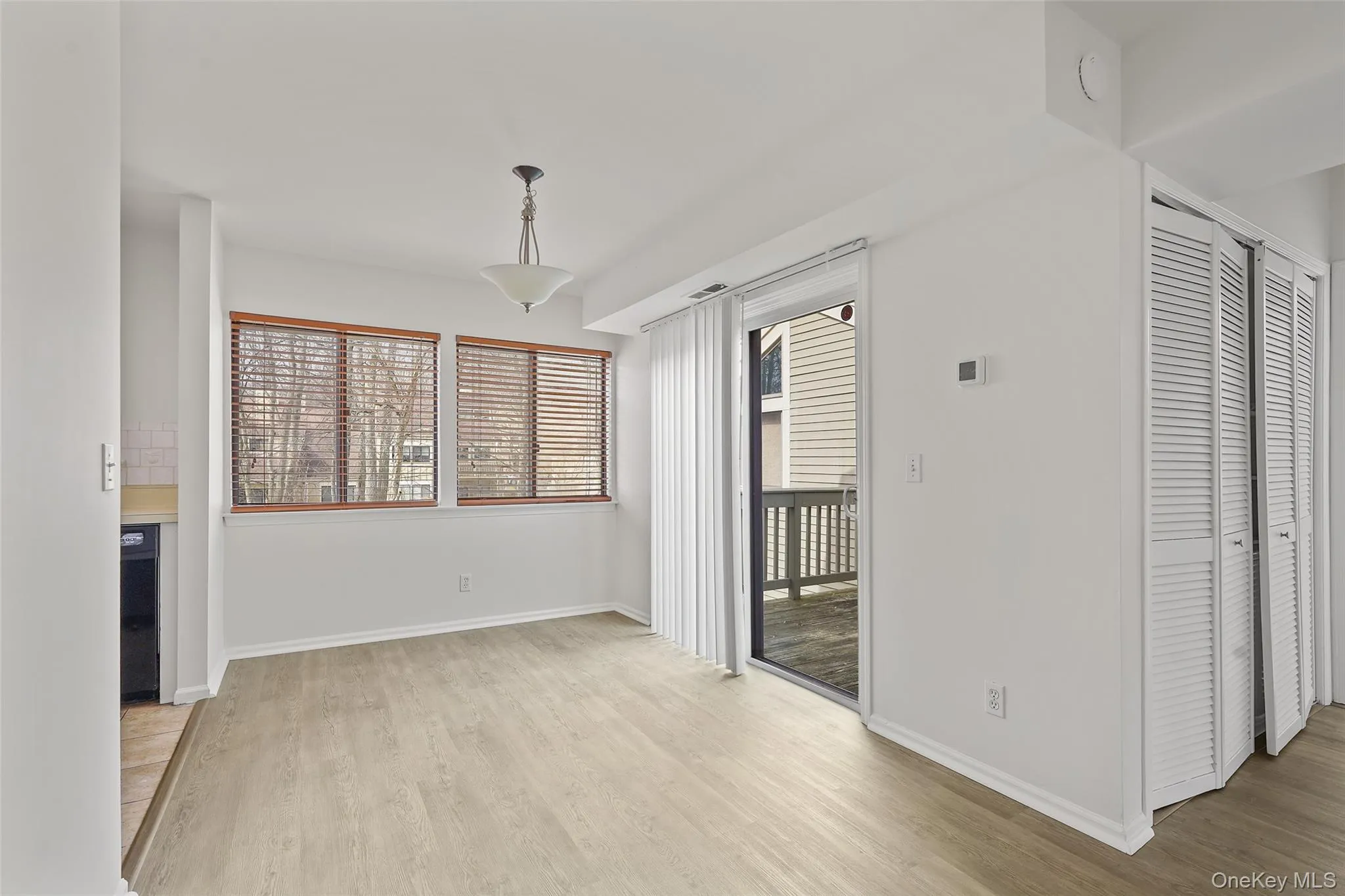 Dining area with sliders to deck Dining area with sliders to deck