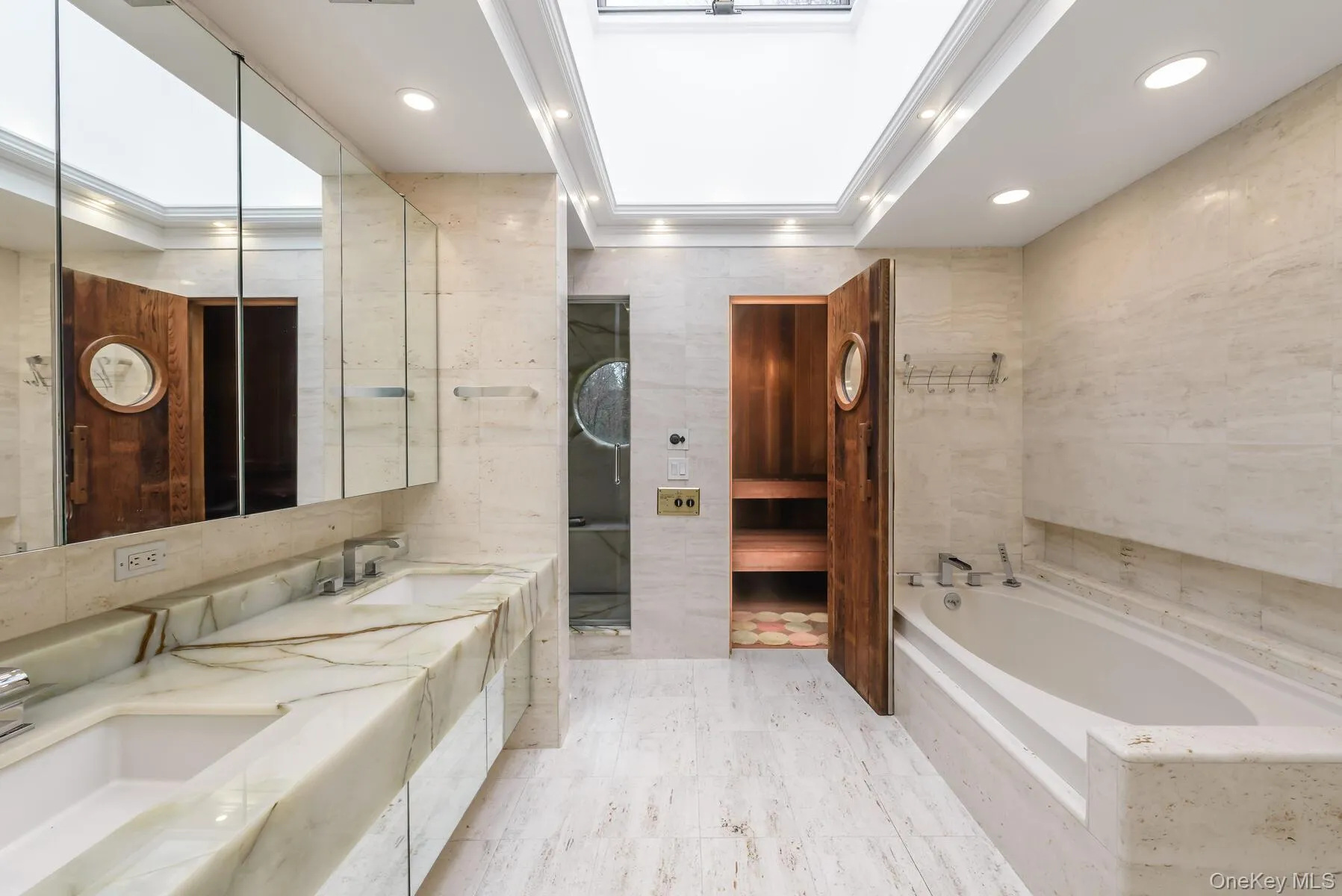 Luxurious Spa Bath with Onyx Counters & WI Shower, Marble floors and Walls surround soaking tub Luxurious Spa Bath with Onyx Counters & WI Shower, Marble floors and Walls surround soaking tub