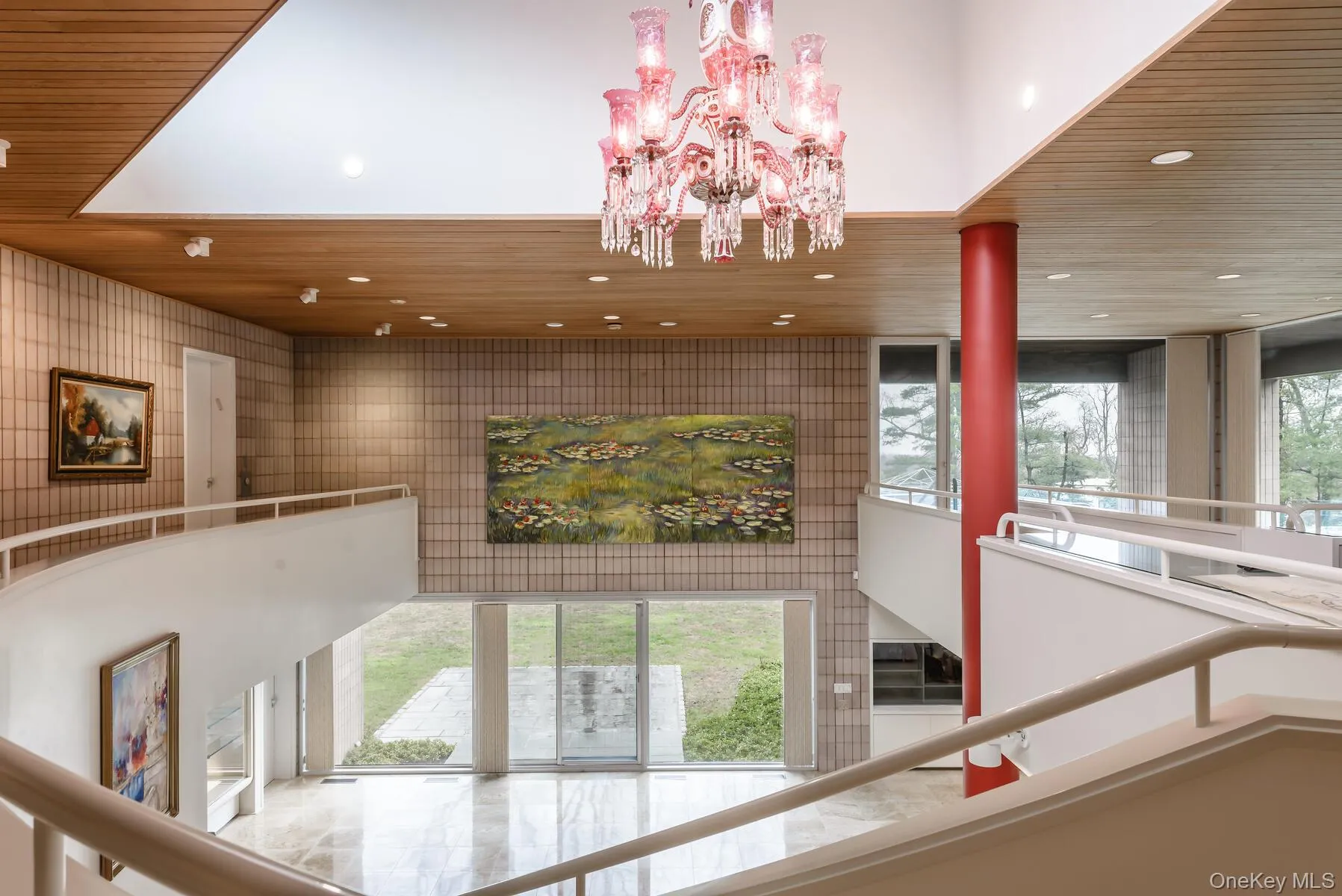 First Floor Wrap around hallway overlooking Great Room. First Floor Wrap around hallway overlooking Great Room.