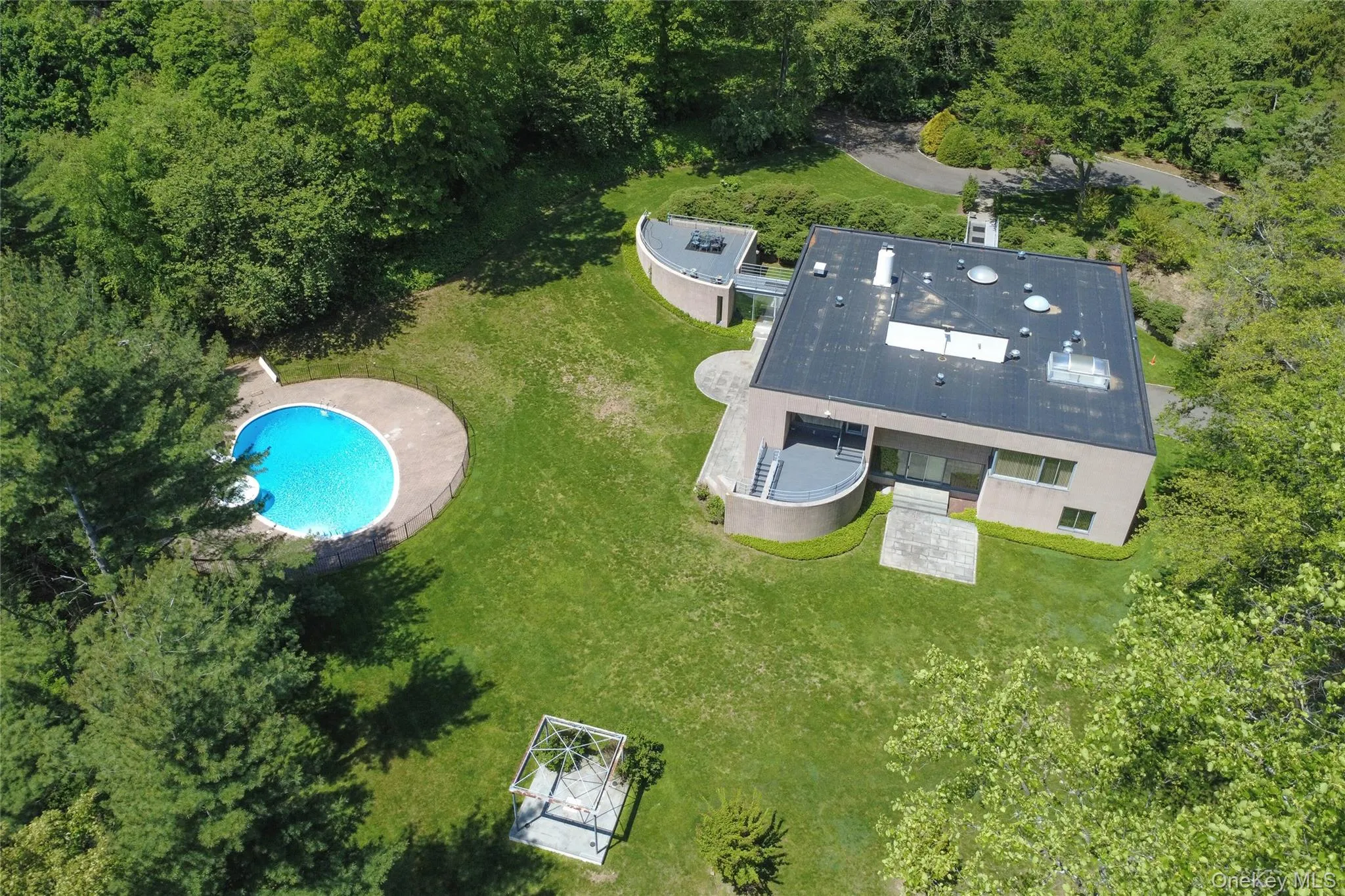 View of subject property with a pool View of subject property with a pool