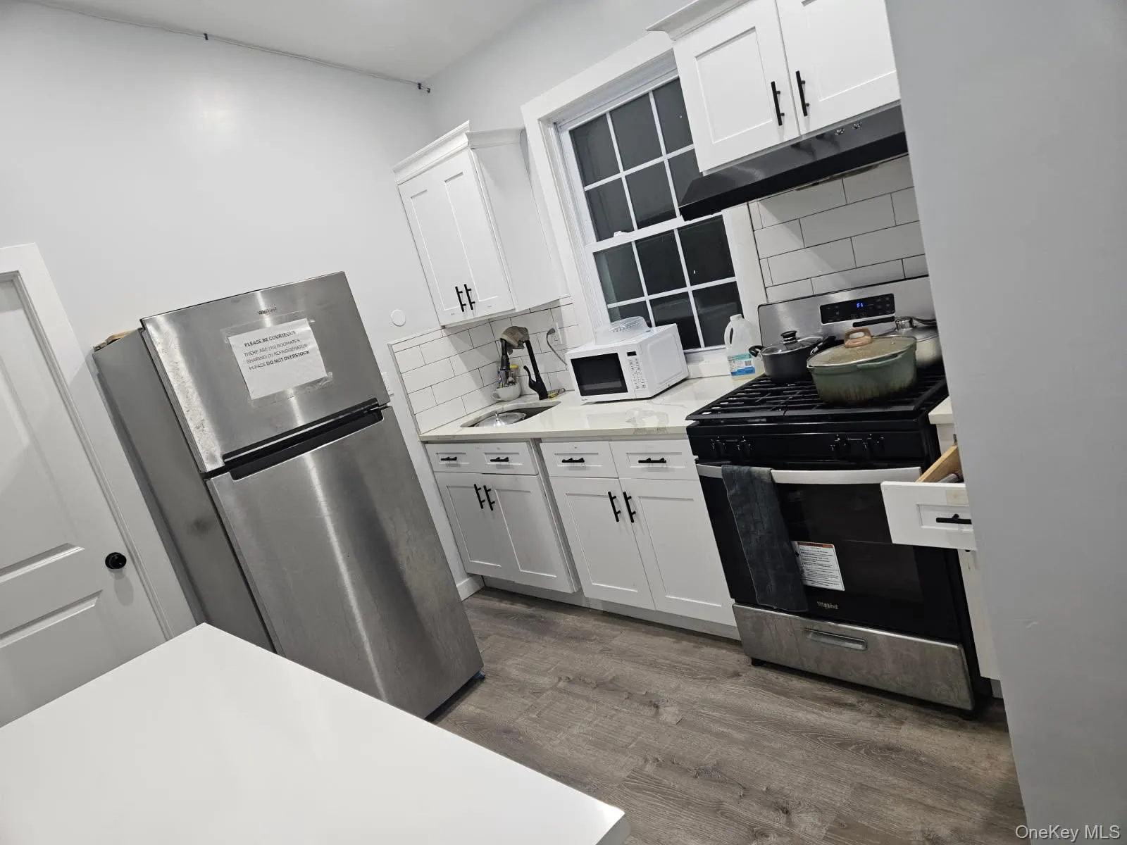 Shared kitchen showing stove Shared kitchen showing stove
