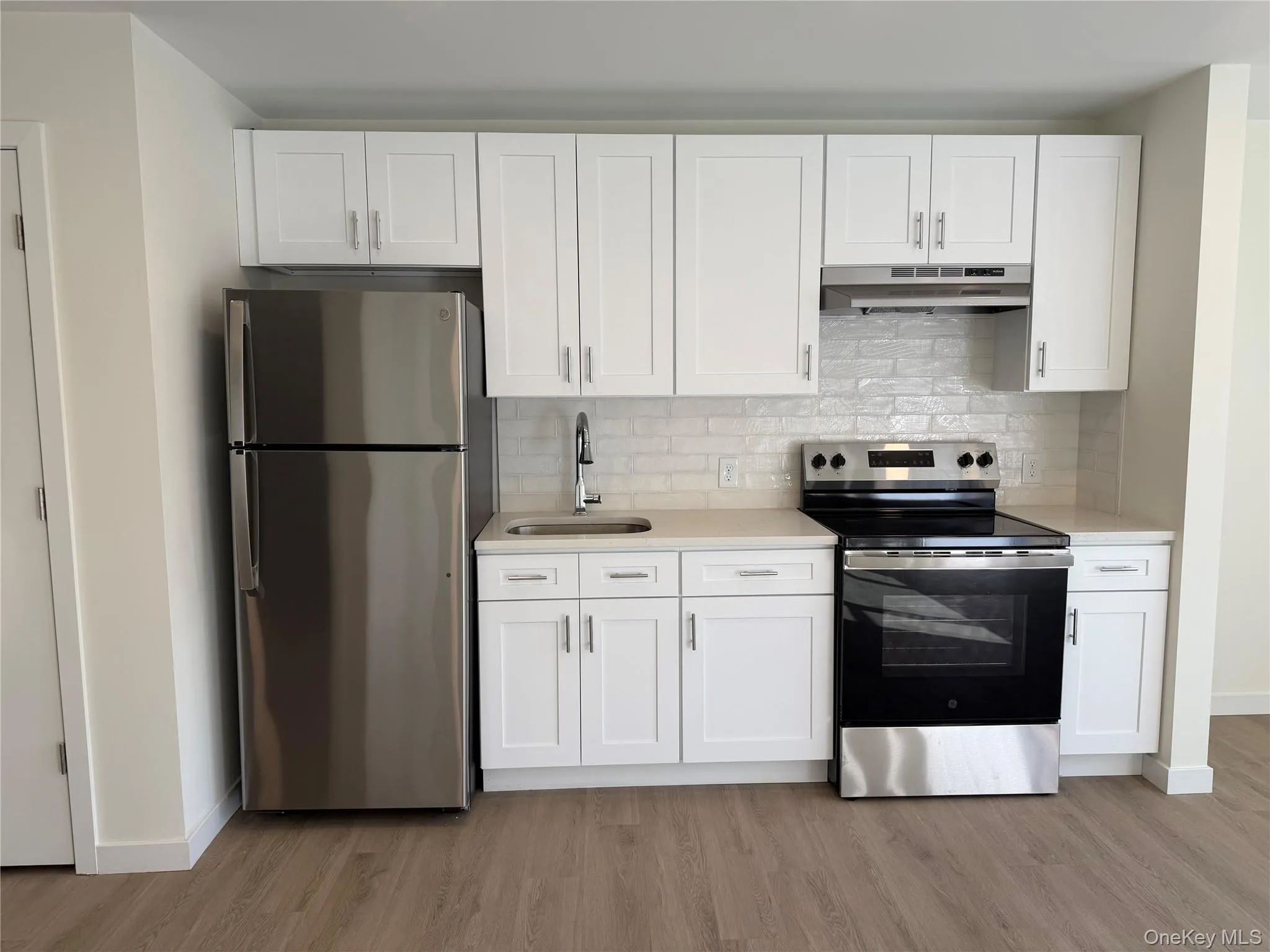 Brand New Kitchen with all energy saving appliances and lots of white cabinets for storage. Brand New Kitchen with all energy saving appliances and lots of white cabinets for storage.