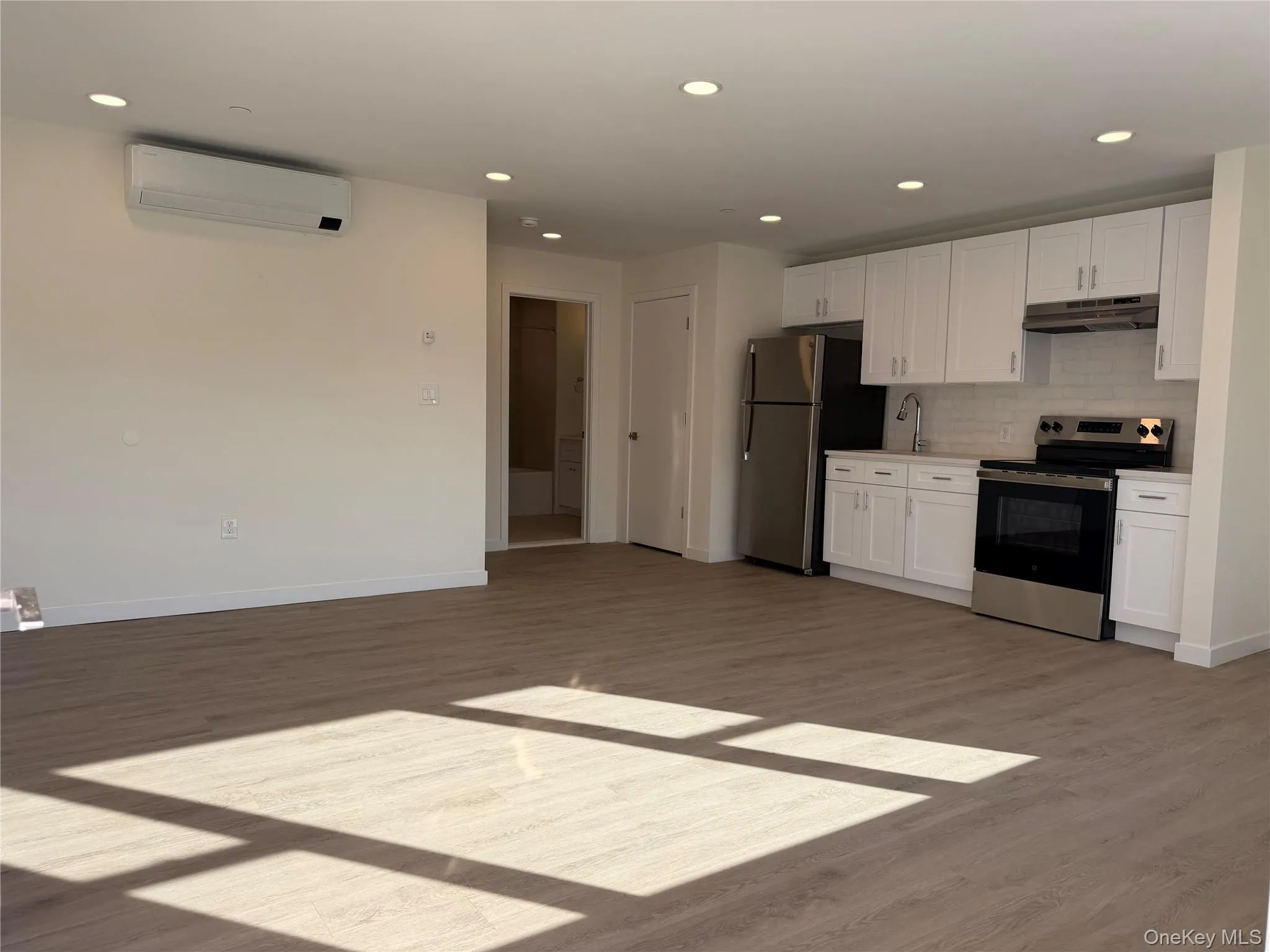 Open Concept Living room with lots of natural Light . Open Concept Living room with lots of natural Light .