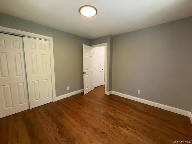 Hardwood flooring throughout, complemented by neutral wall tones and white trim Hardwood flooring throughout, complemented by neutral wall tones and white trim