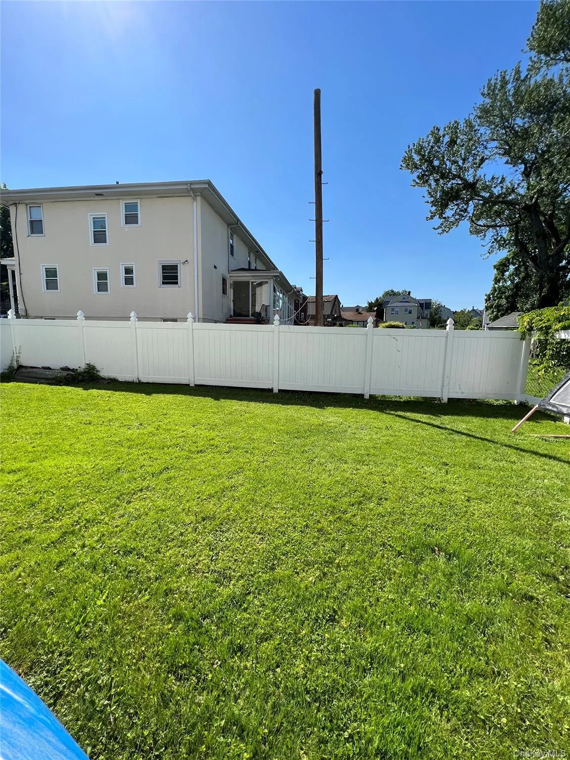 View of yard with fence View of yard with fence