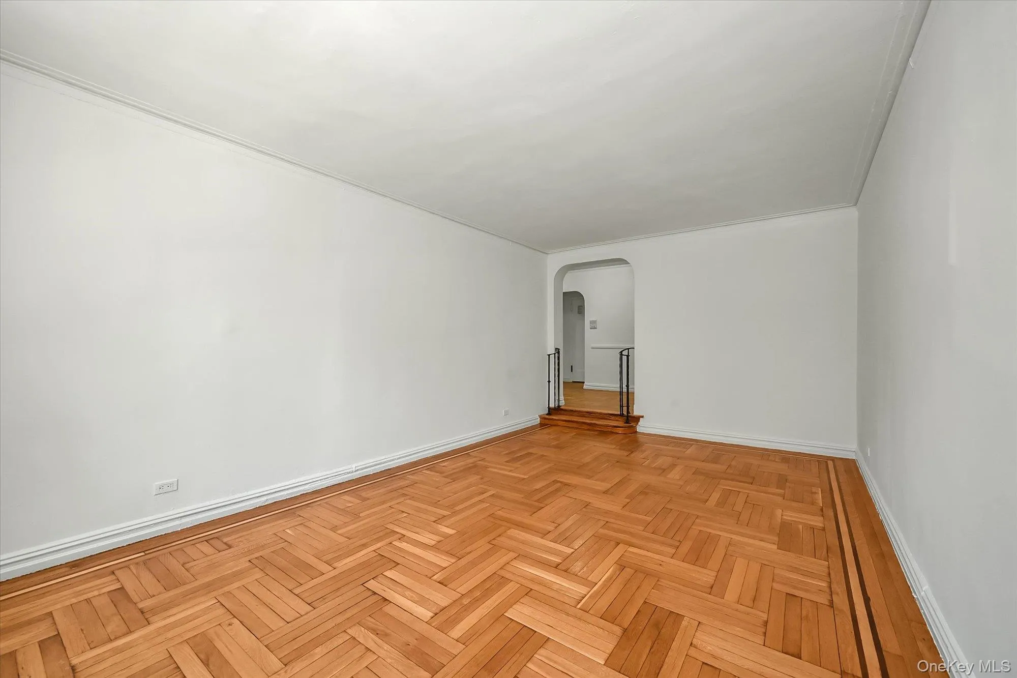 Living room featuring parquet floors Living room featuring parquet floors