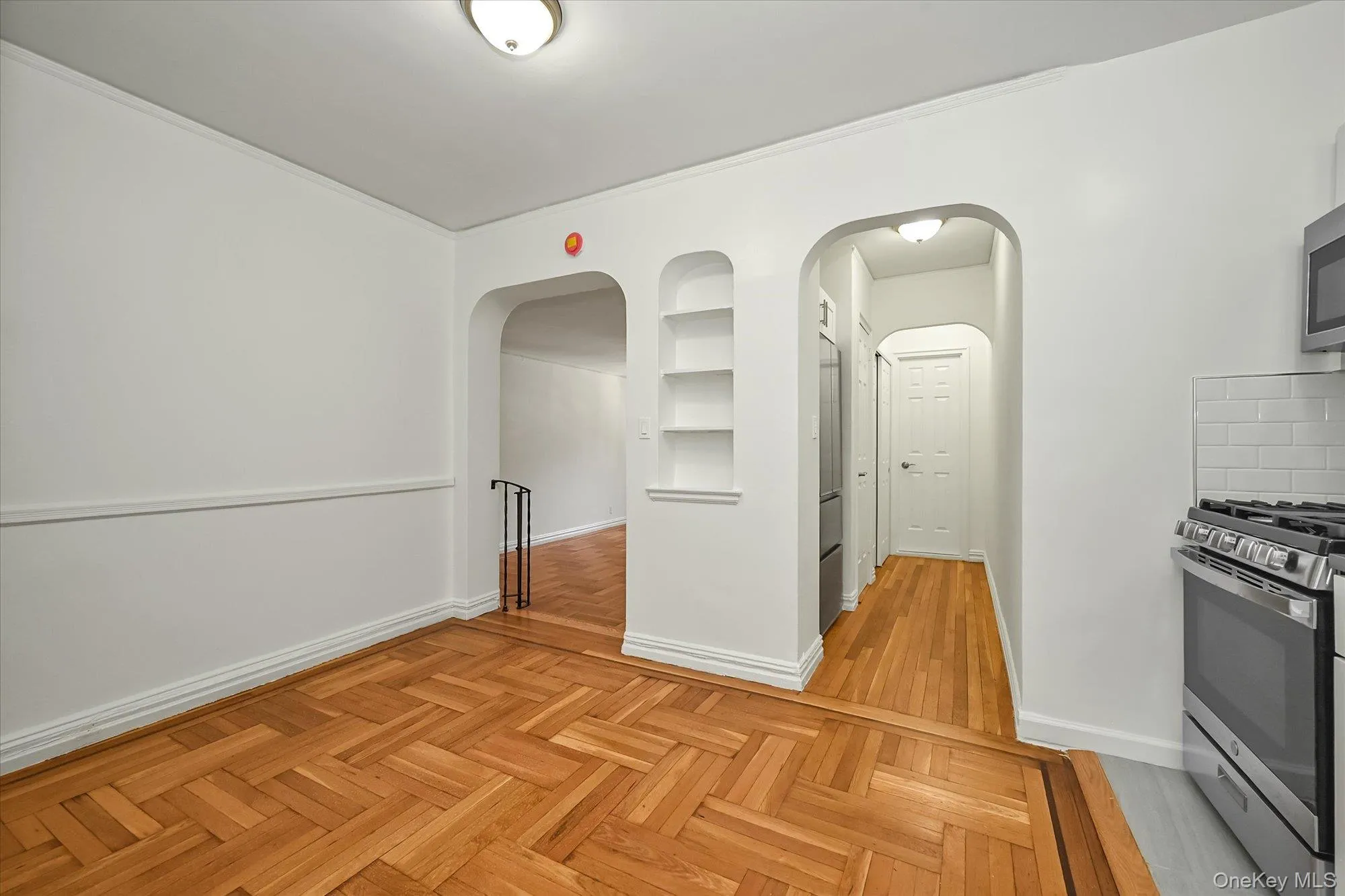 Another kitchen view with arched walked ways. Another kitchen view with arched walked ways.