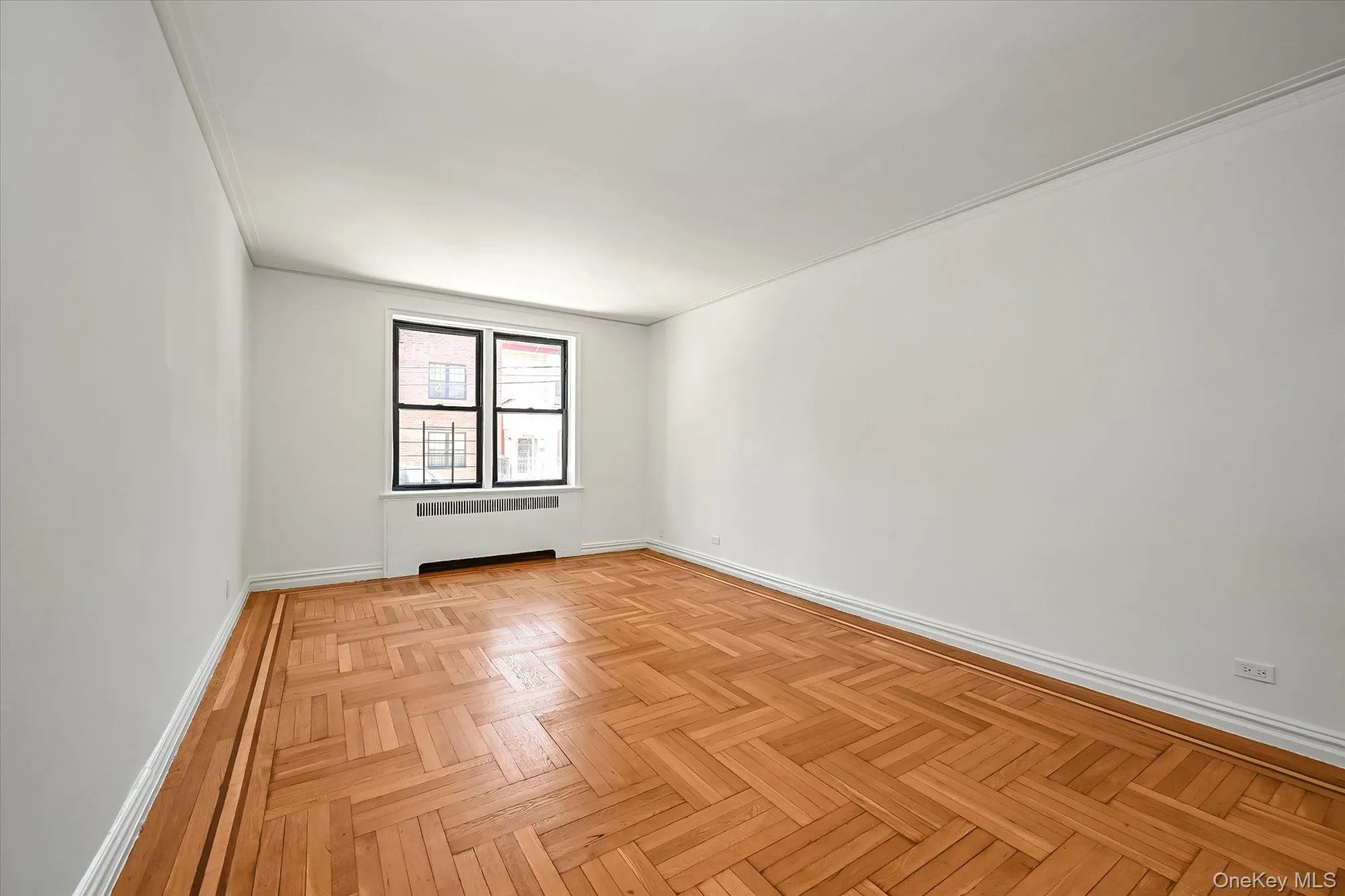 More living room with parquet flooring More living room with parquet flooring