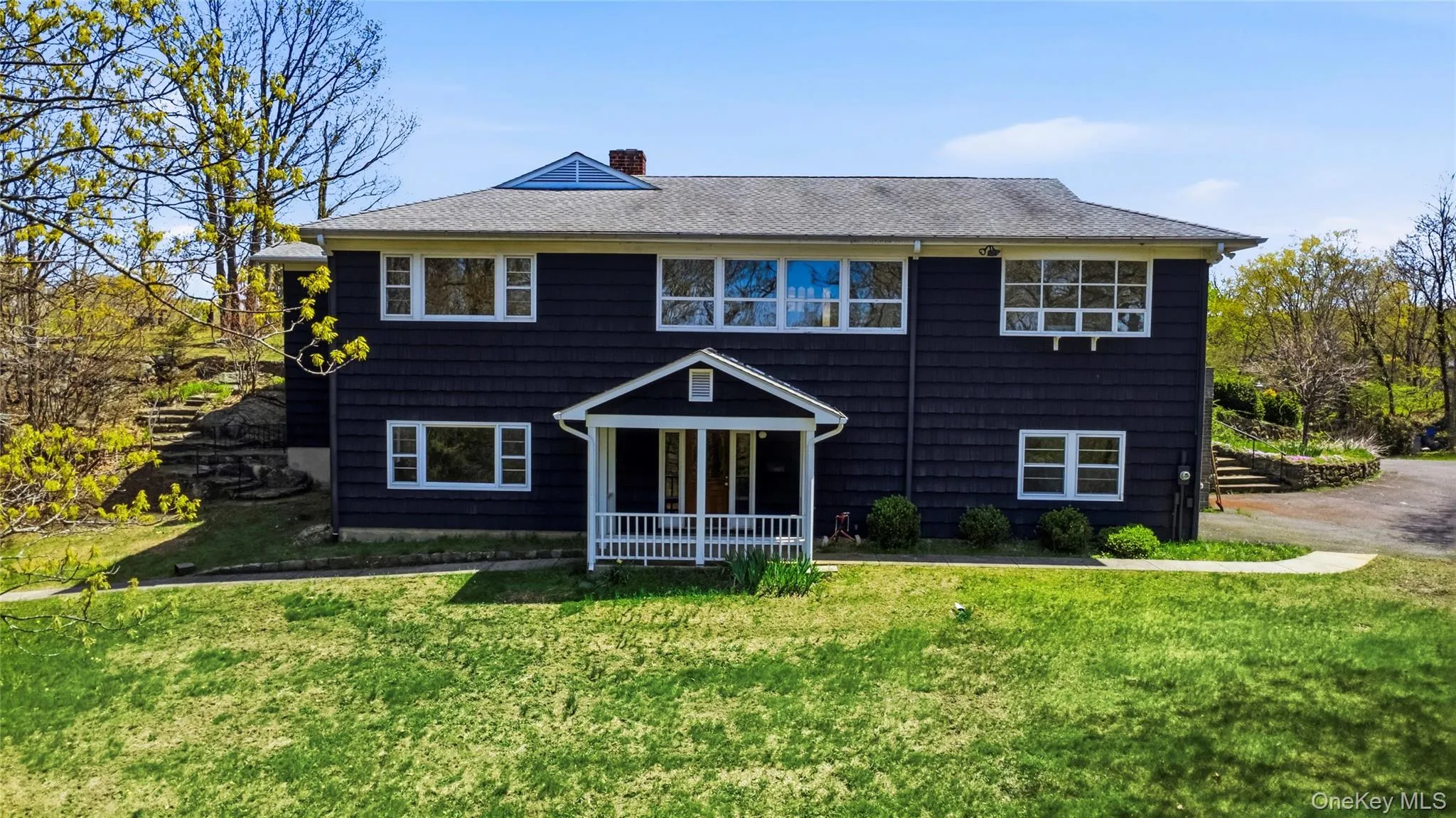 Tucked at the end of a quiet cul-de-sac, this exceptional estate offers rare privacy on more than 3 picturesque acres. Grass digitally enhanced. Tucked at the end of a quiet cul-de-sac, this exceptional estate offers rare privacy on more than 3 picturesque acres. Grass digitally enhanced.