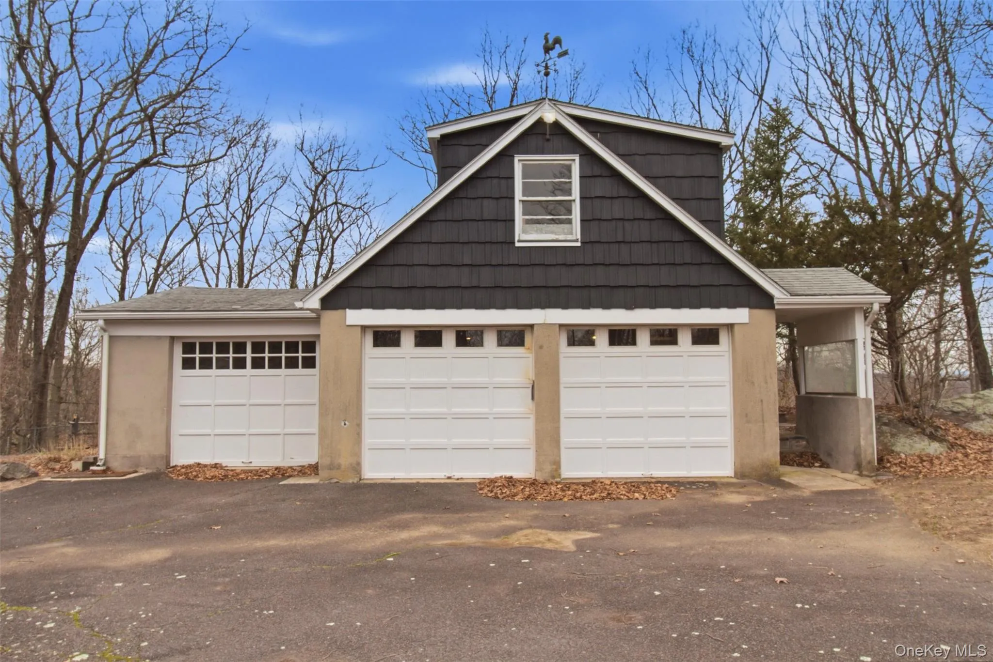 Detached garage with studio above. Detached garage with studio above.