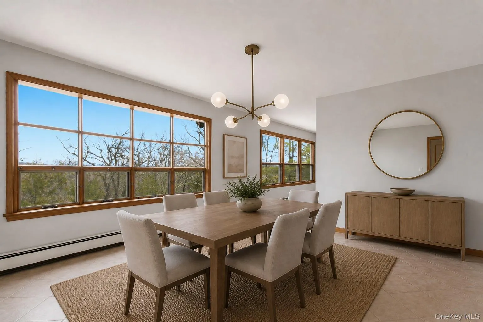 Virtually staged dining room. Virtually staged dining room.