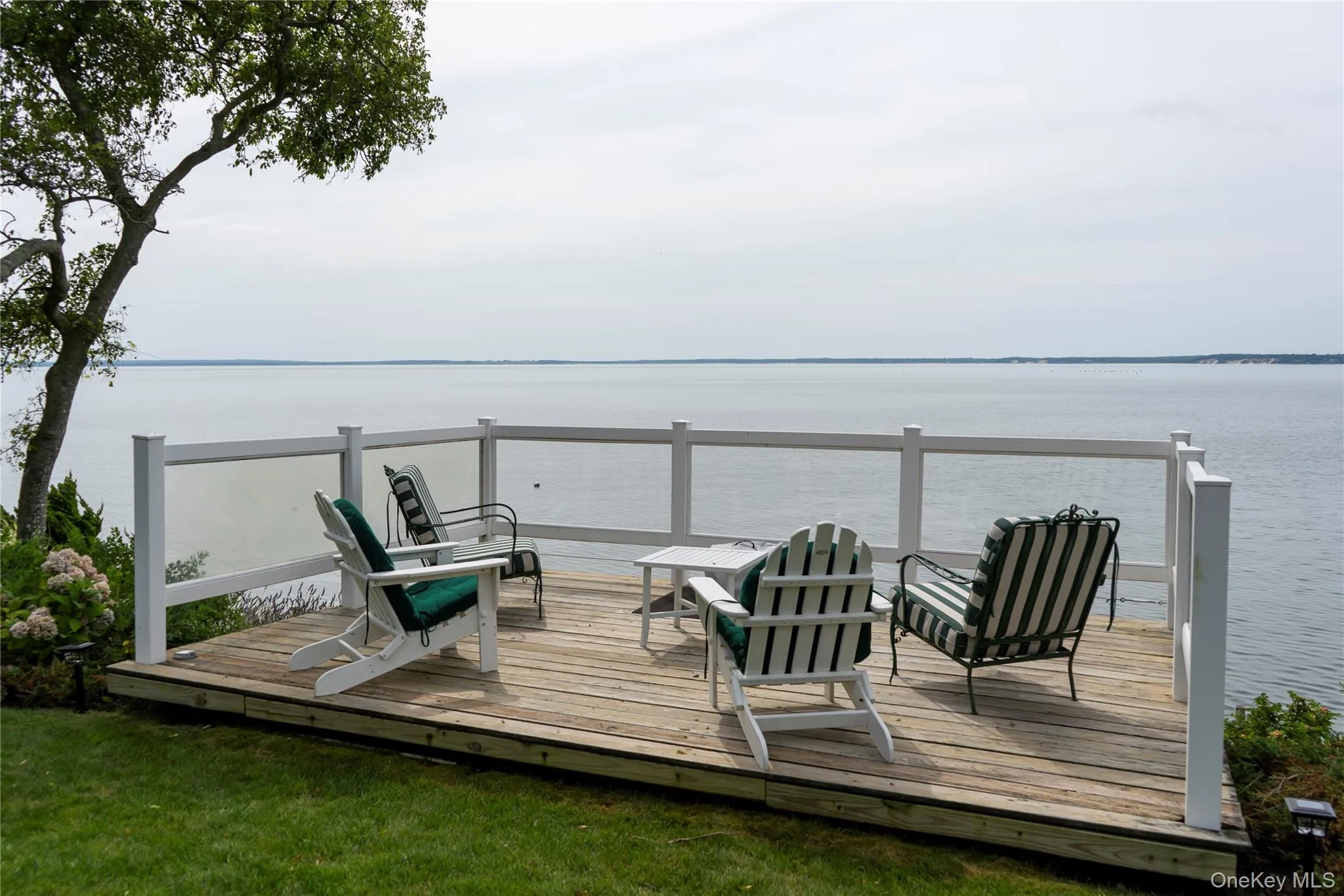 Terrace featuring a water view Terrace featuring a water view
