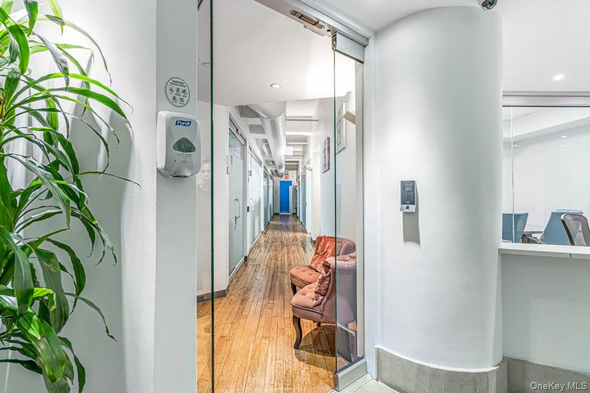 Hallway with light wood-style floors Hallway with light wood-style floors
