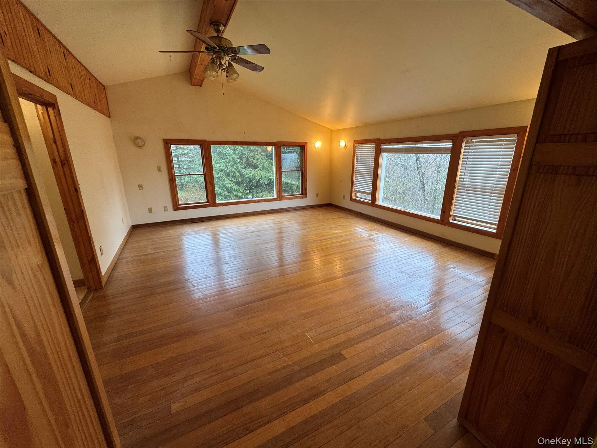 Large bedroom with wood flooring and nice views on 2nd floor Large bedroom with wood flooring and nice views on 2nd floor