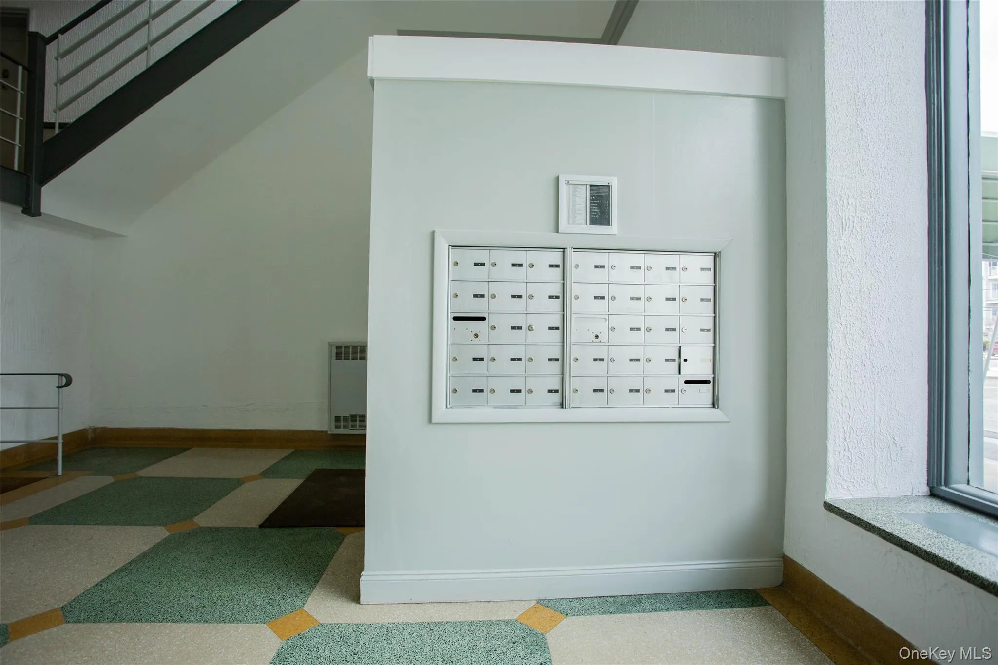 Detailed view of mail area and baseboards Detailed view of mail area and baseboards