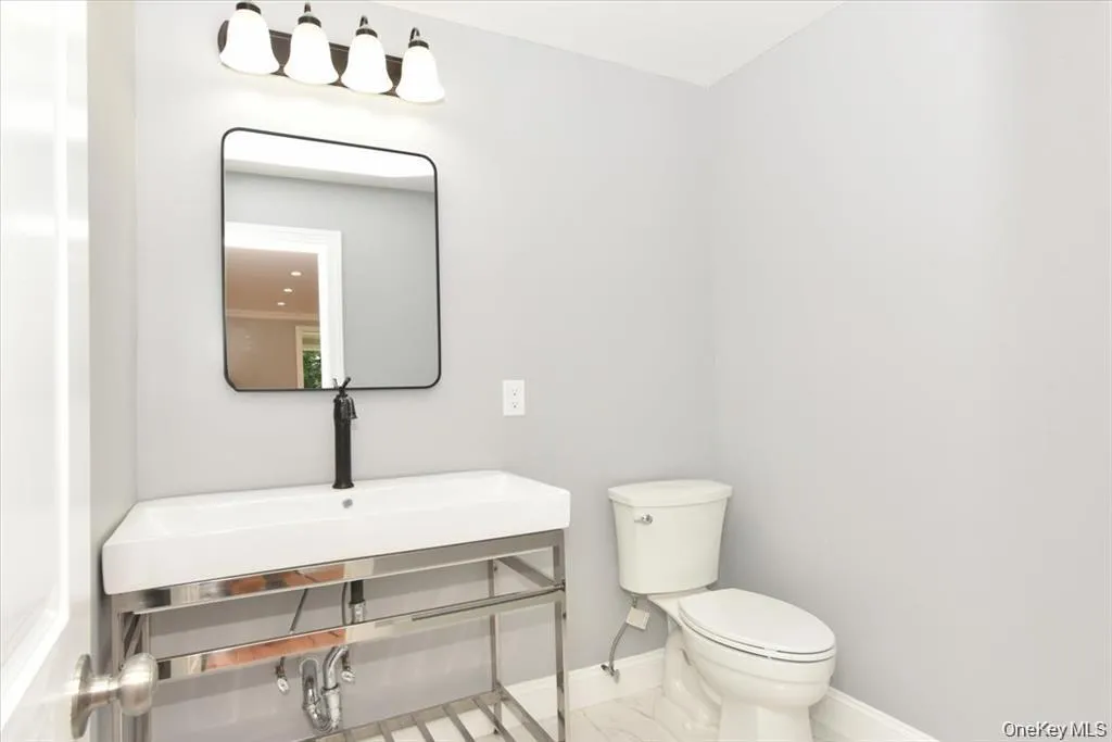 Half bathroom, bathroom #2 First floor Half bathroom, bathroom #2 First floor