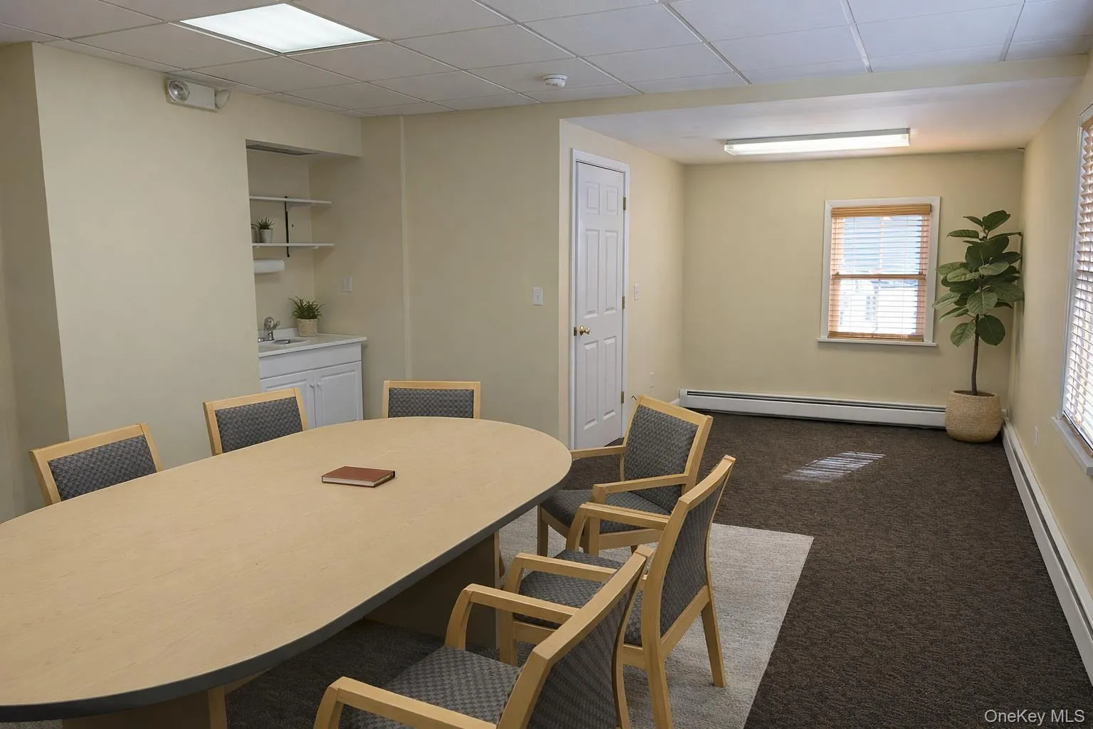 Conference area with hand sink - AI Enhanced Image Conference area with hand sink - AI Enhanced Image