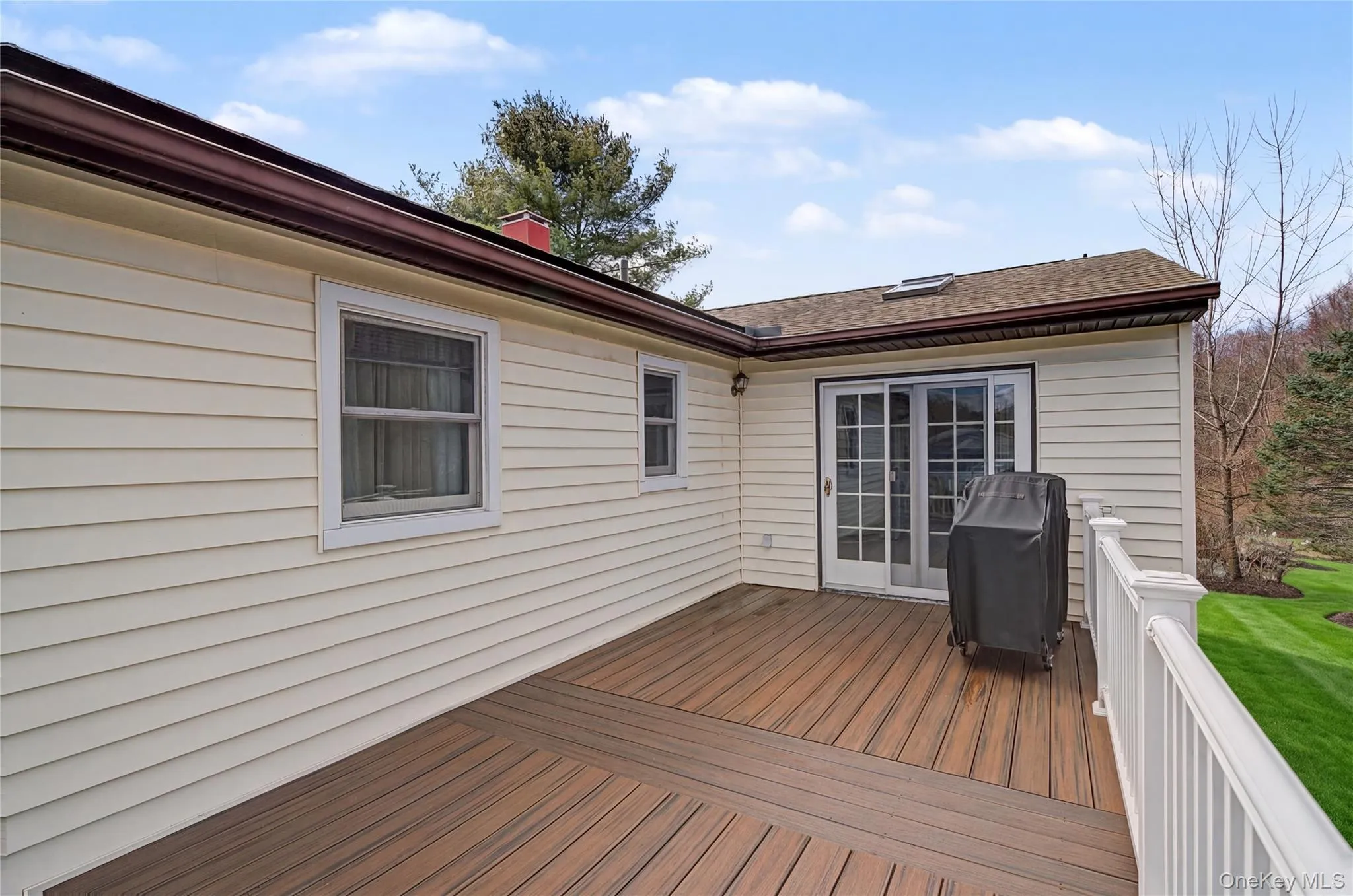 Wooden deck with area for grilling Wooden deck with area for grilling