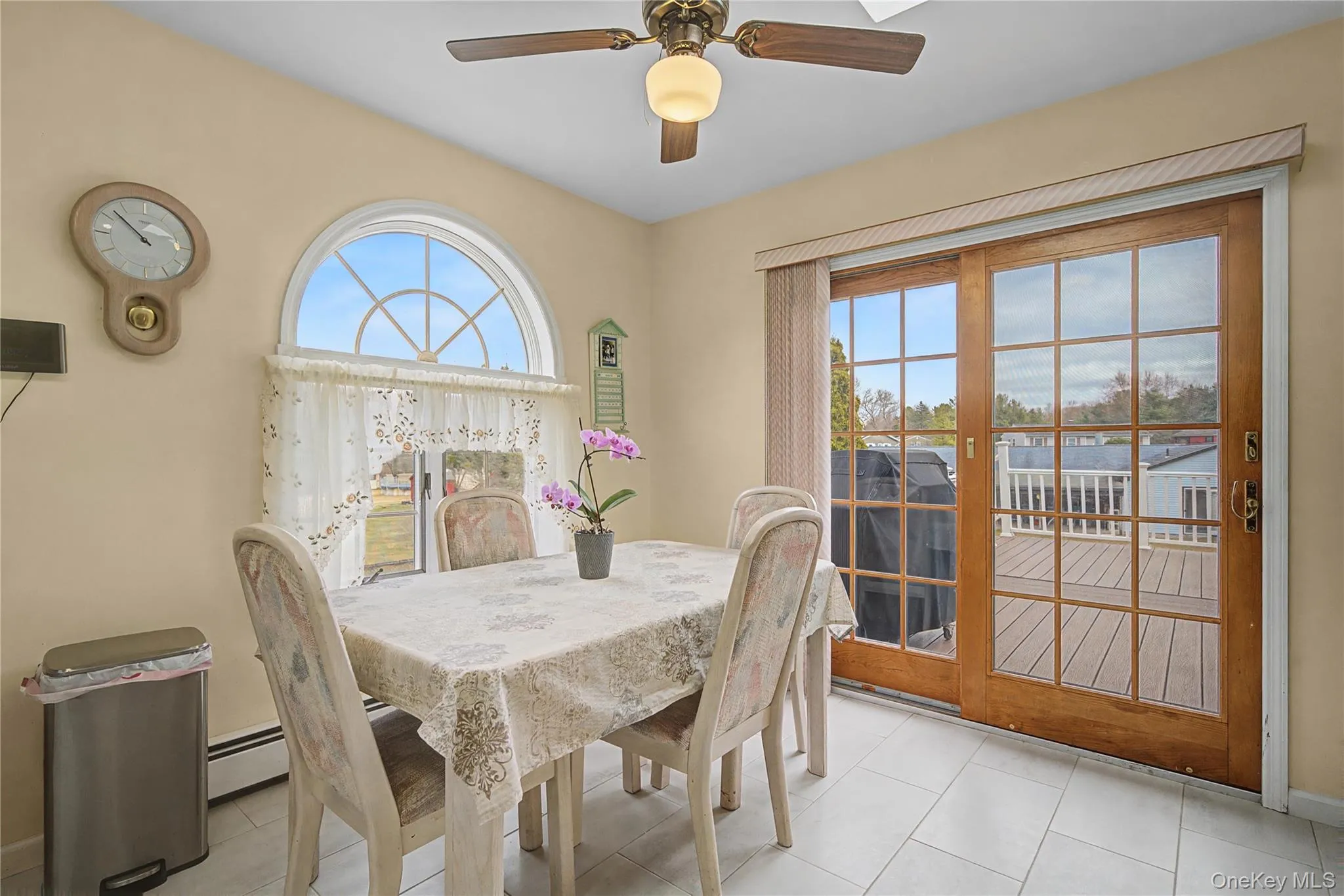 Eat In Kitchen with plenty of natural light, ceiling fan, and baseboard heating Eat In Kitchen with plenty of natural light, ceiling fan, and baseboard heating