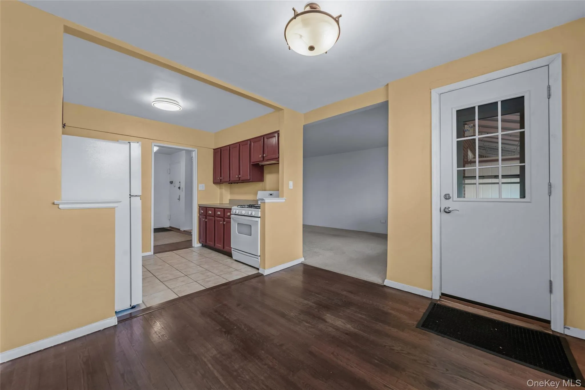 Dining area with balcony door, hardwood floors Dining area with balcony door, hardwood floors